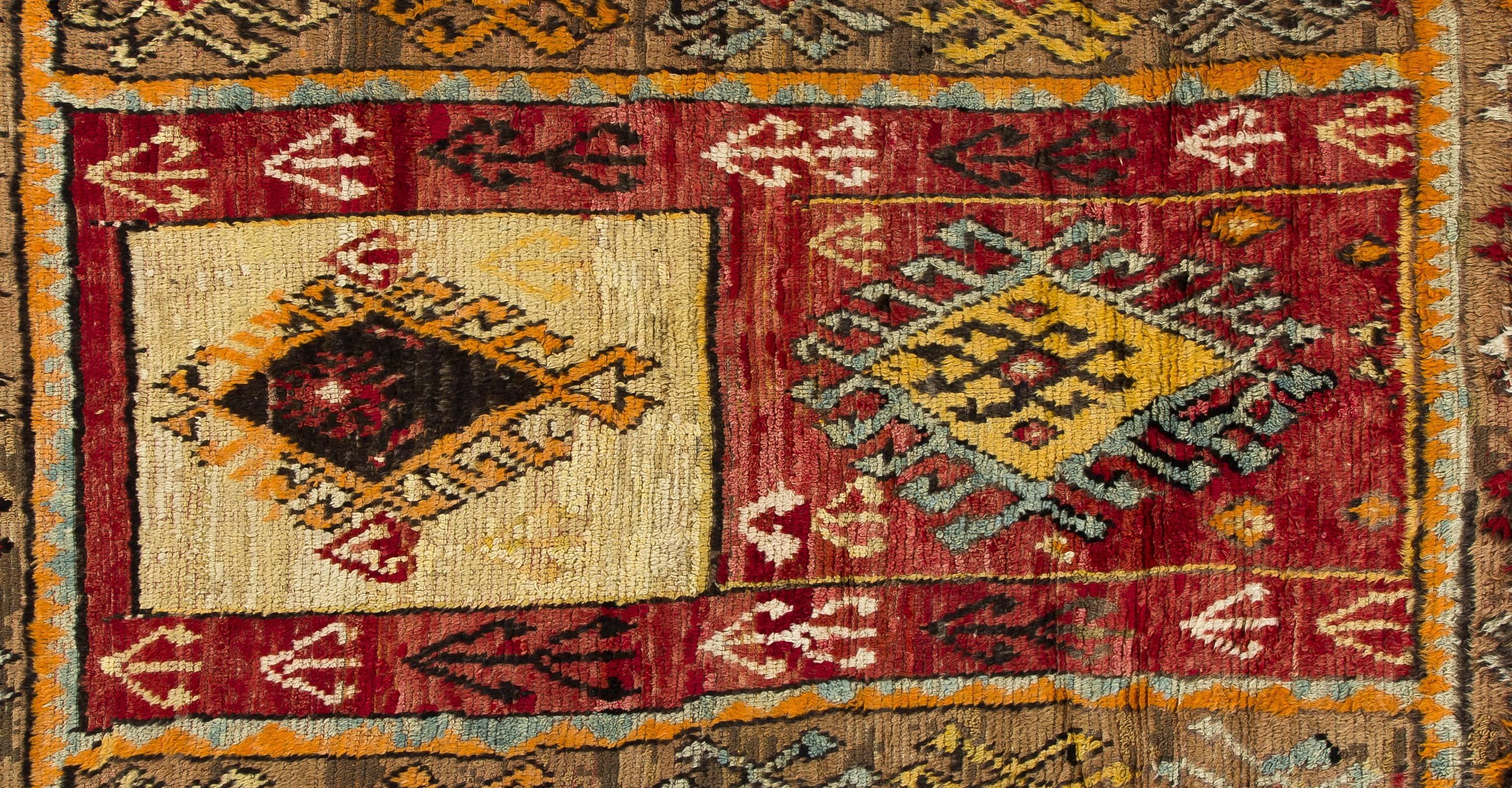 An archaic and unique antique hand-knotted rug produced by the nomads in Central Anatolia by the turn of the century for their daily use rather than re-sale purpose. Lustrous wool pile on cotton foundation, well preserved original condition.