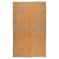 Tapis turc vintage de 5x8,7 m en orange brûlé. Circa 1960. Tapis en laine fait à la main