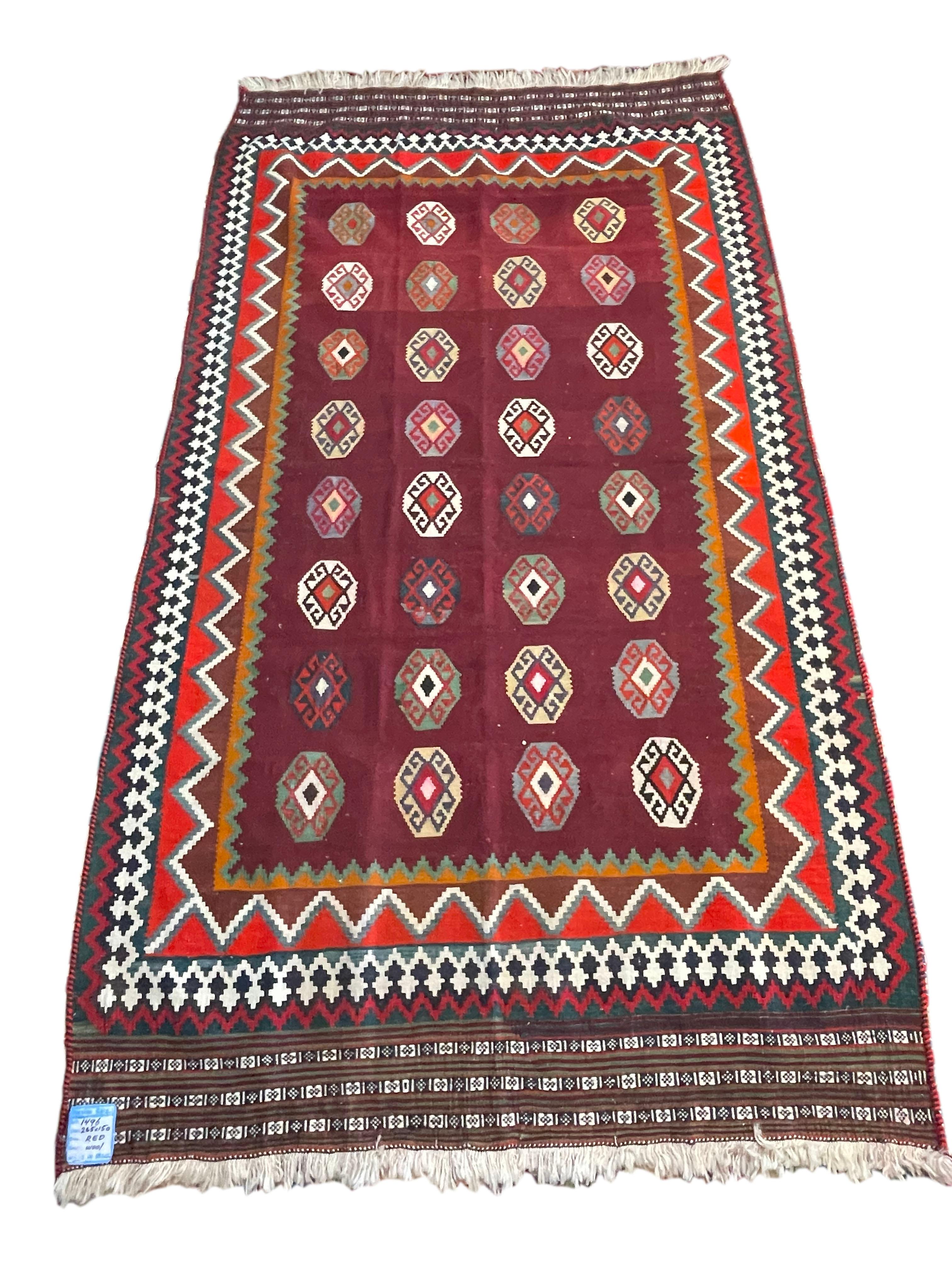 Vibrant 60's Kashkooli Kilim. This beautiful piece is 100% tightly woven, naturally dyed wool. The Kashkooli subtribe of the Qashqai's weave the finest, most intricate tribal rugs in the world. These bright colors and complex borders are a dead give
