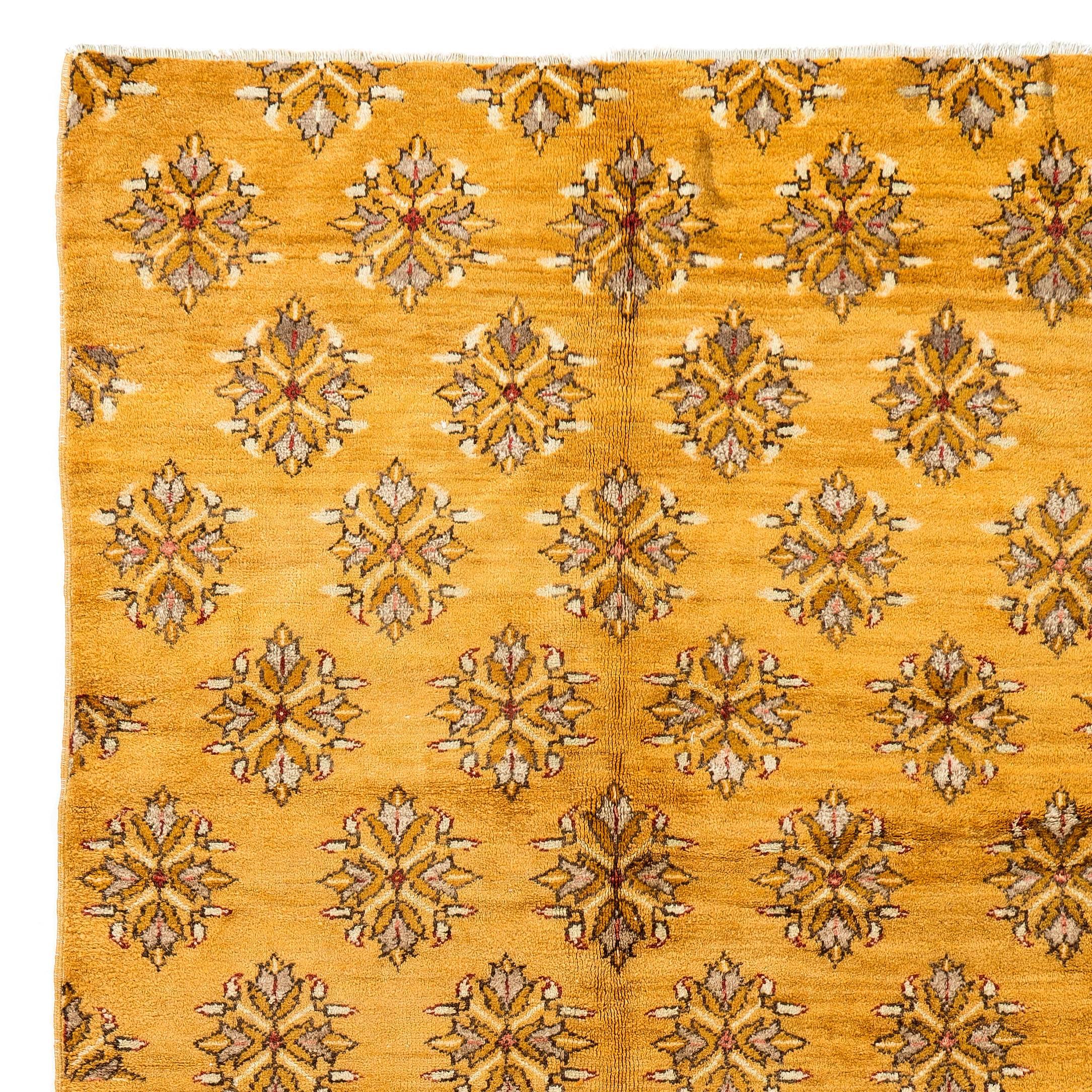 An unusual Central Anatolian rug from the village of Karapinar. Simple yet beautiful open ended floral design on a natural dyed yellow ground. The rug is made of lustrous handspun sheep wool and in well preserved original condition. Measures: 5 x