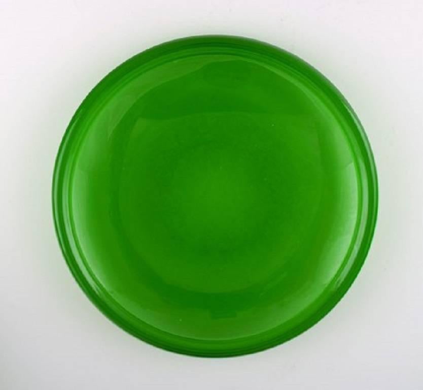 12 plates in green art glass, Josef Frank.
Reijmyre / Gullaskruf.
In very good condition.
Measures: 19 and 16 cm.