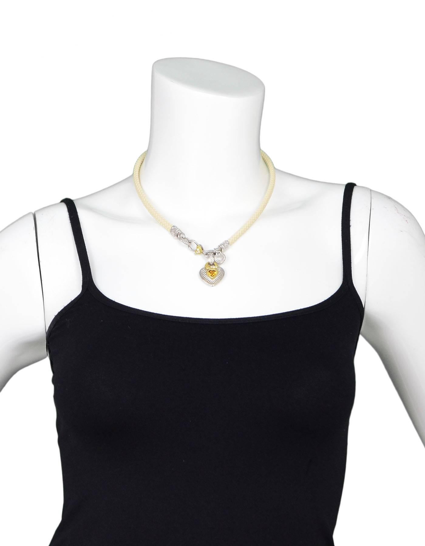 Judith Ripka Ivory Woven Leather with Sterling, Gold & Diamond Necklace

Features woven leather with sterling, yellow gold, diamond and citrine heard pendant enhancer

Color: Ivory, silver, gold, orange
Materials: 18k yellow gold, sterling silver,