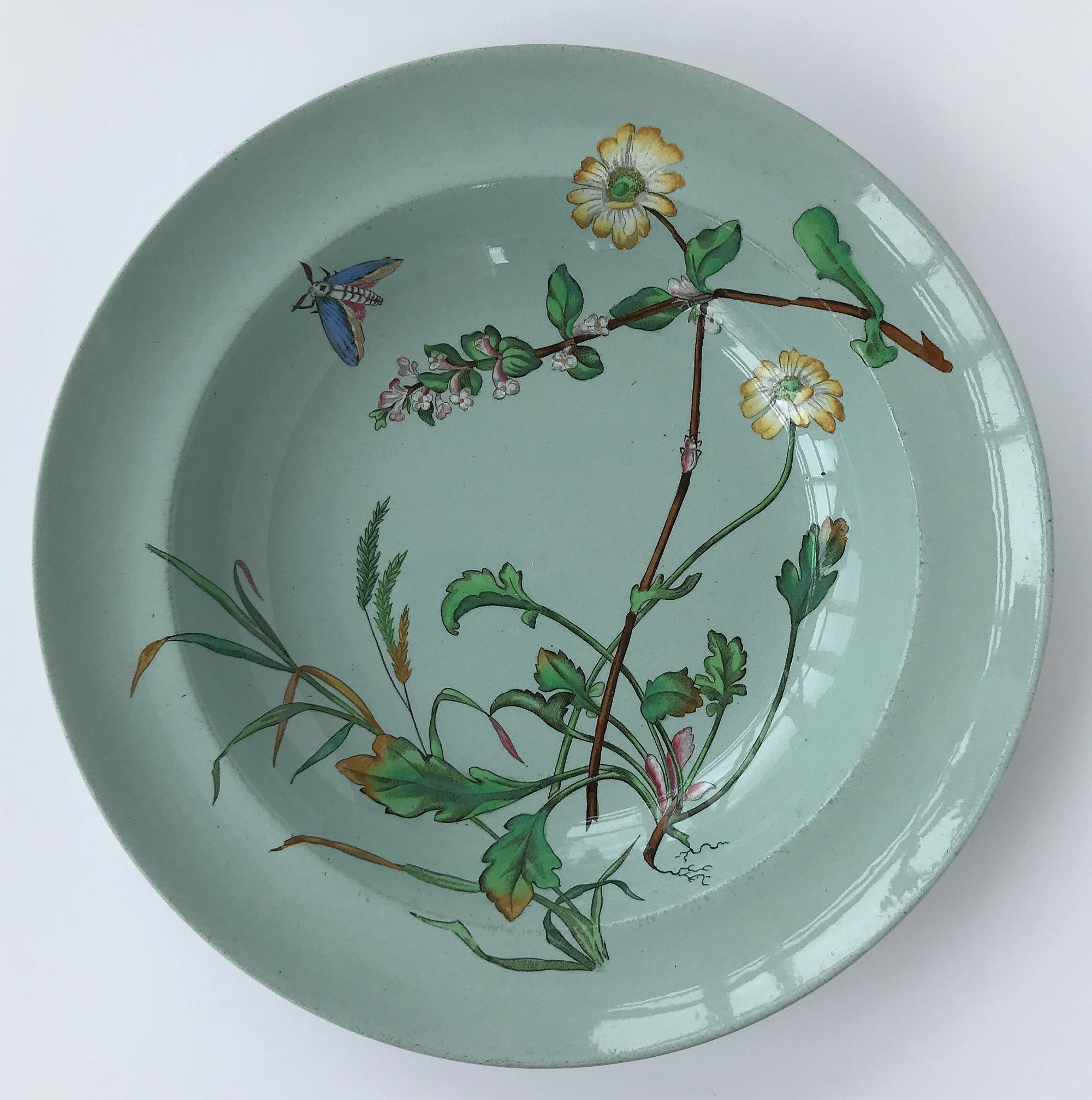 6 rare Minton celadon aesthetic movement botanical soup bowls, circa 1878, decorated with sprays of wild flowers and butterflies in polychrome enamels. Each bowl has different plants and composition.
All six are in excellent condition, no damage,