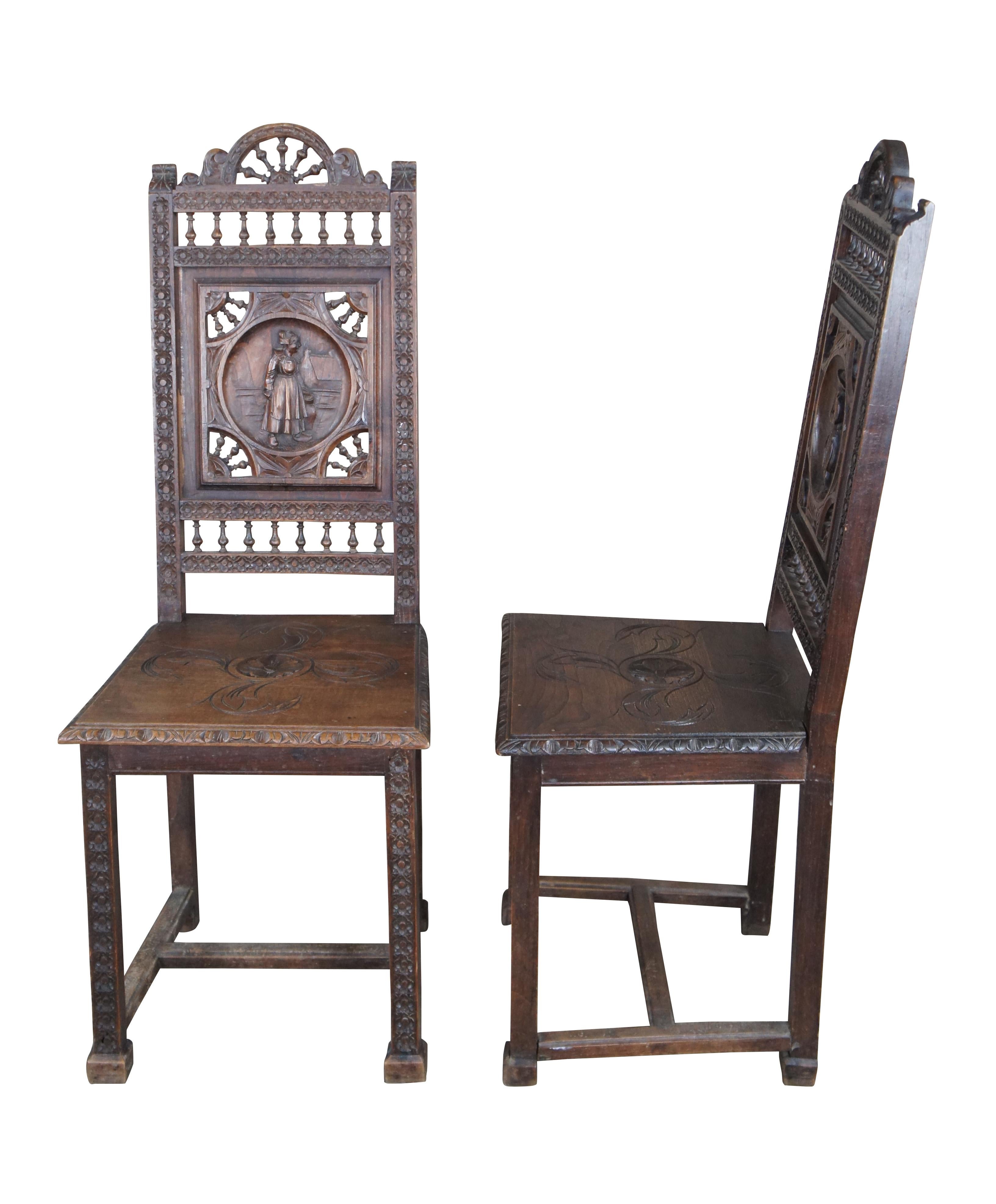 Exquisite Antique Brittany (Bretagne) French dining room chairs, circa last quarter 19th century.  This beautiful set was hand crafted from chestnut featuring pierced nautical wheel like carvings, floret medallions and several scenes of men and