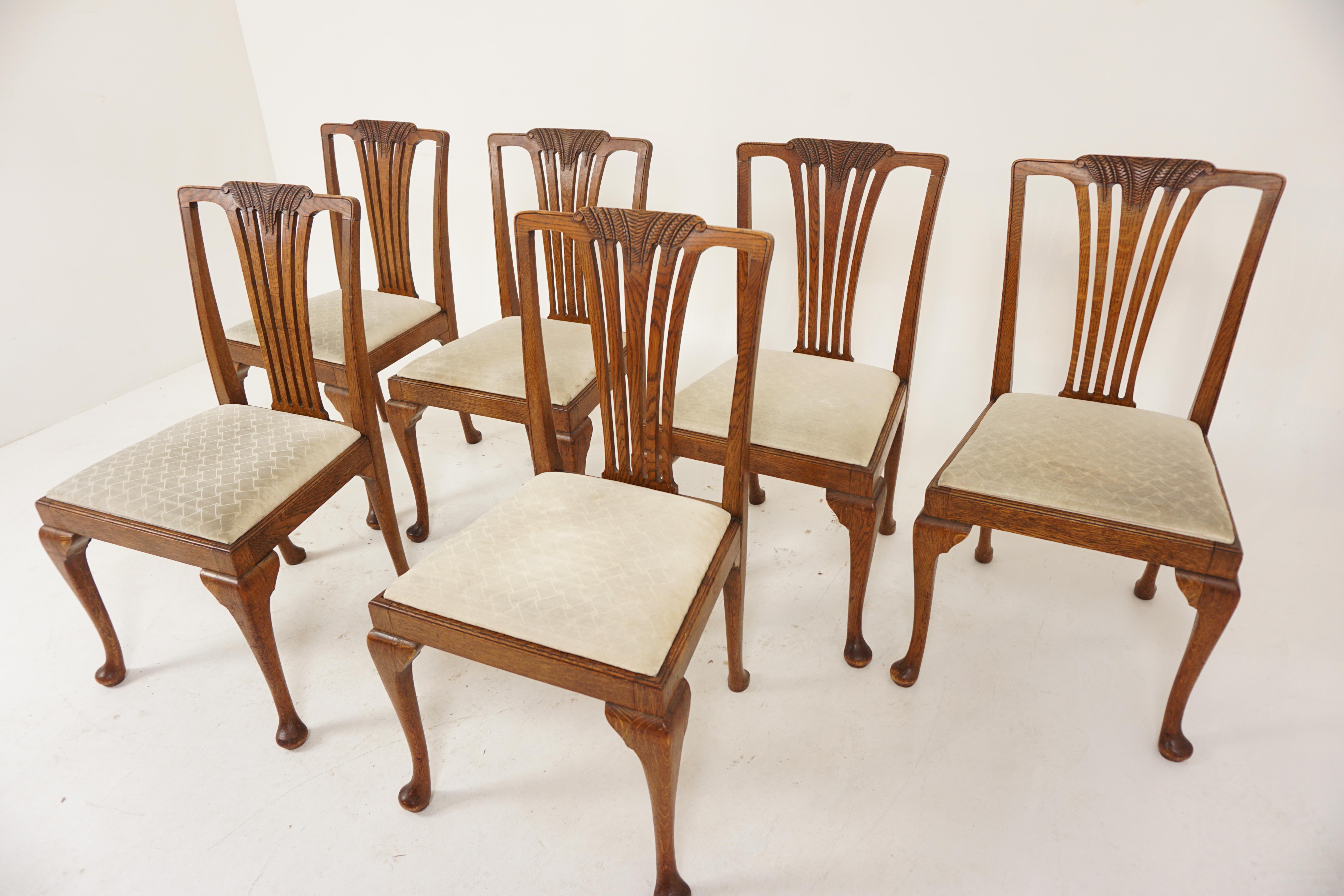 6 antique carved oak Queen Anne style dining chairs, Scotland 1920, B2899

Scotland 1920
Solid oak
Original finish
Carved top rail
With shaped back splats to the back
Large drop in upholstered seat
Standing on cabriole legs to the front and