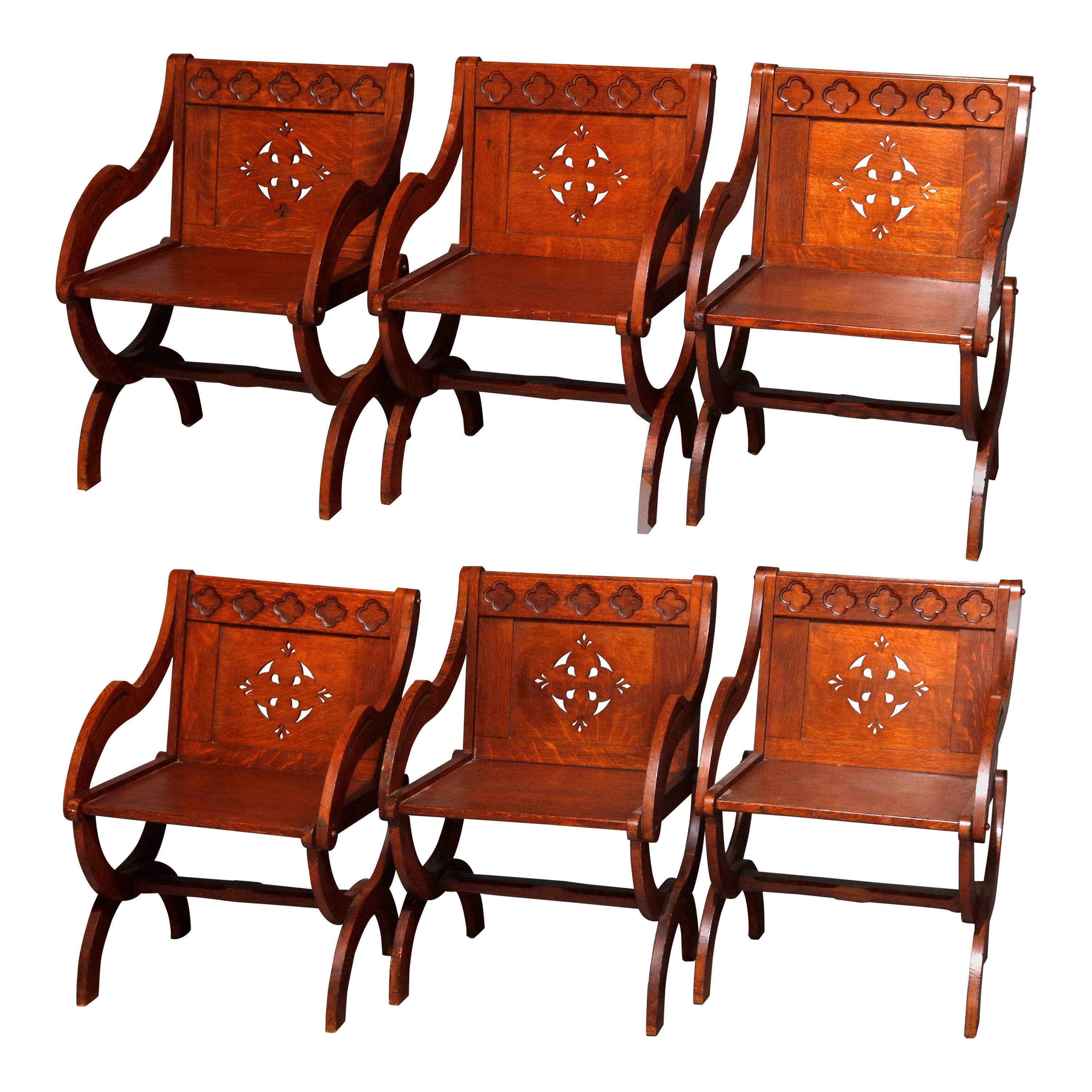 6 Antique Gothic Carved & Cut-Out Oak Curule Form Armchairs, circa 1900