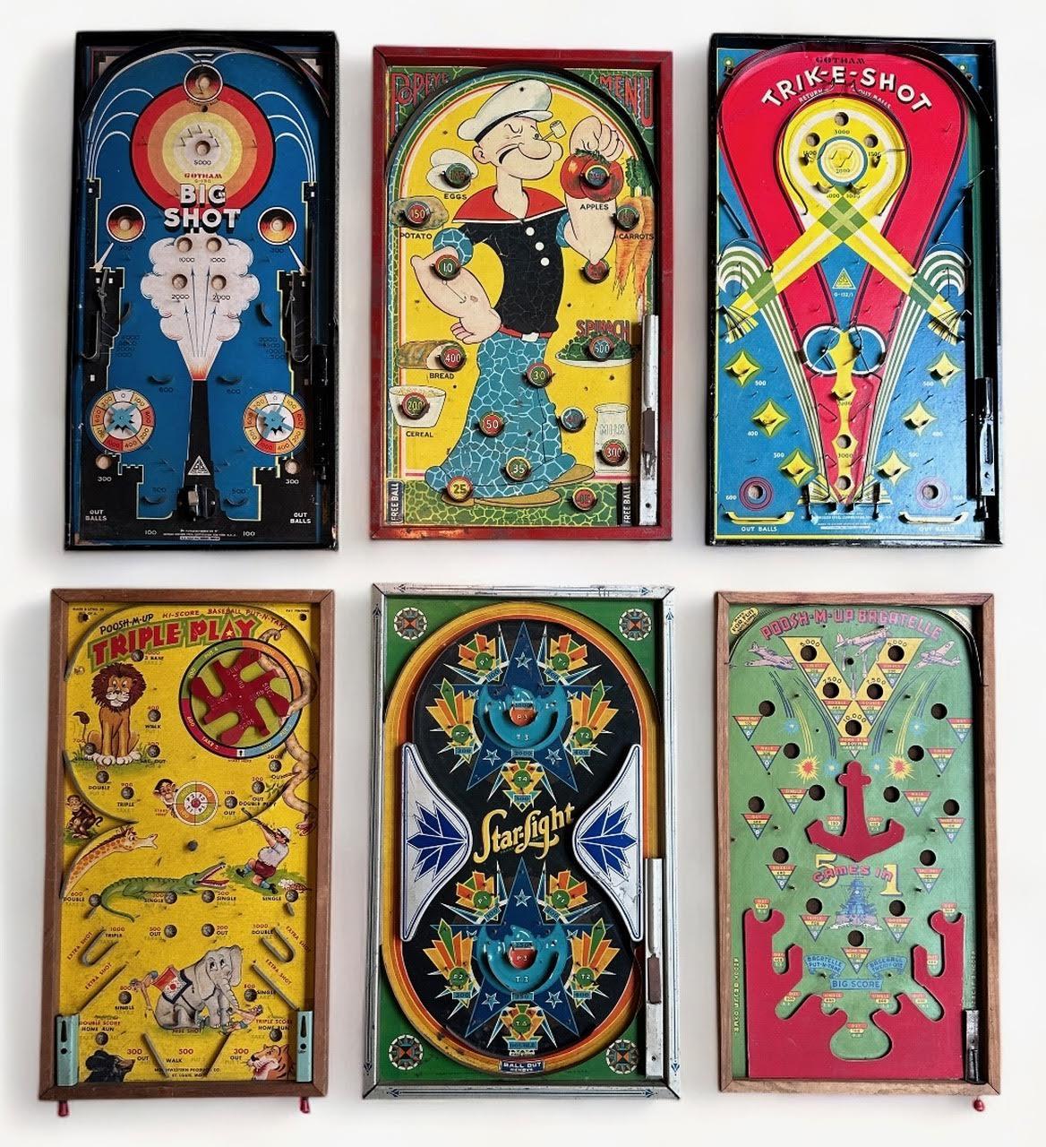 A collection of 6 very graphic table top pinball games. These date to the 1930's and 1940's. They are in great condition for these types of pinball games which are normally destroyed, stained and ruined by the children who owned them. Included in