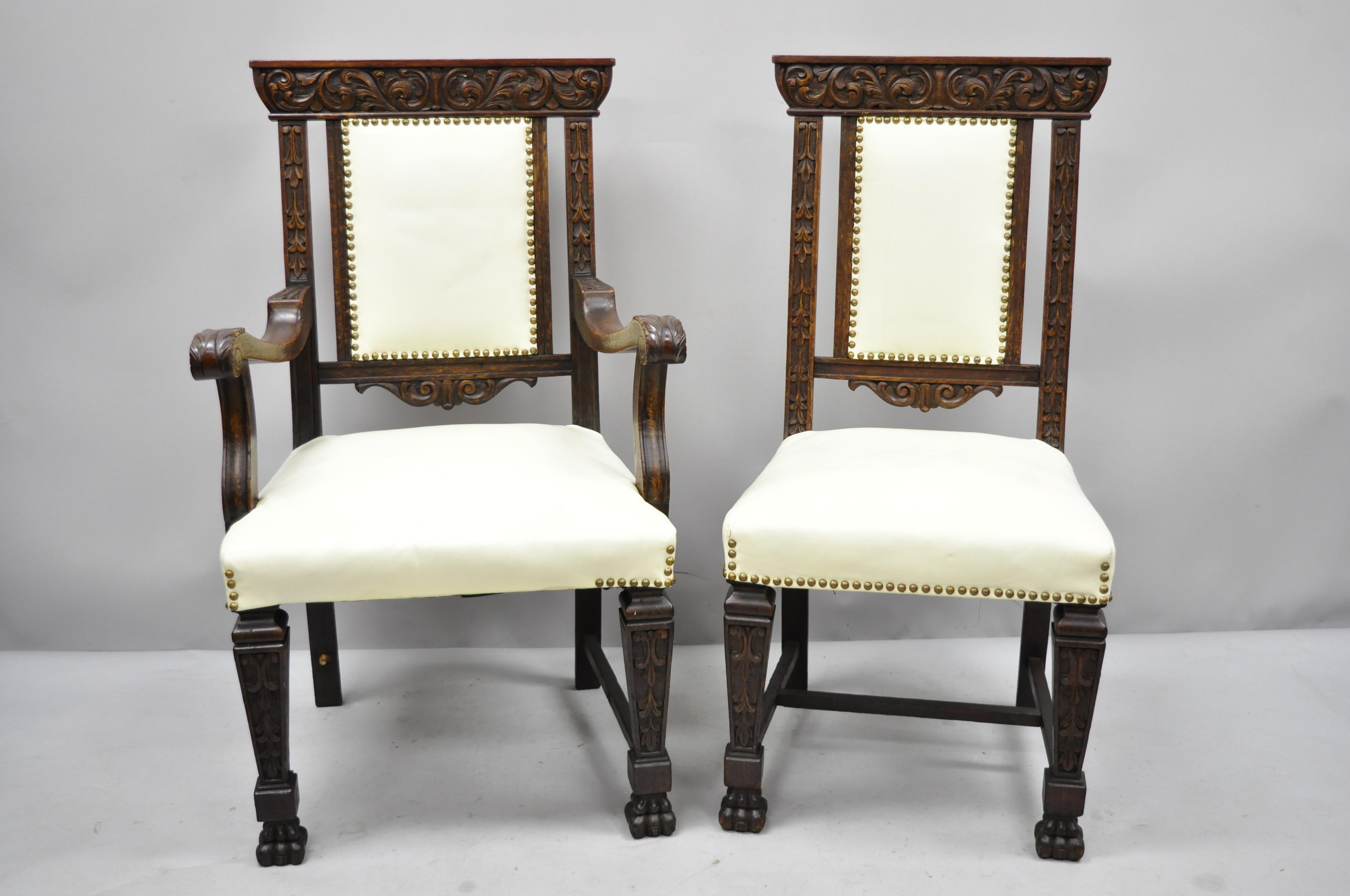 6 antique Italian Renaissance carved oakwood upholstered dining chairs. Listing features (5) side chairs, (1) armchair, solid wood construction, beautiful wood grain, finely carved details, very nice antique item, circa early 1900s. Measurements: