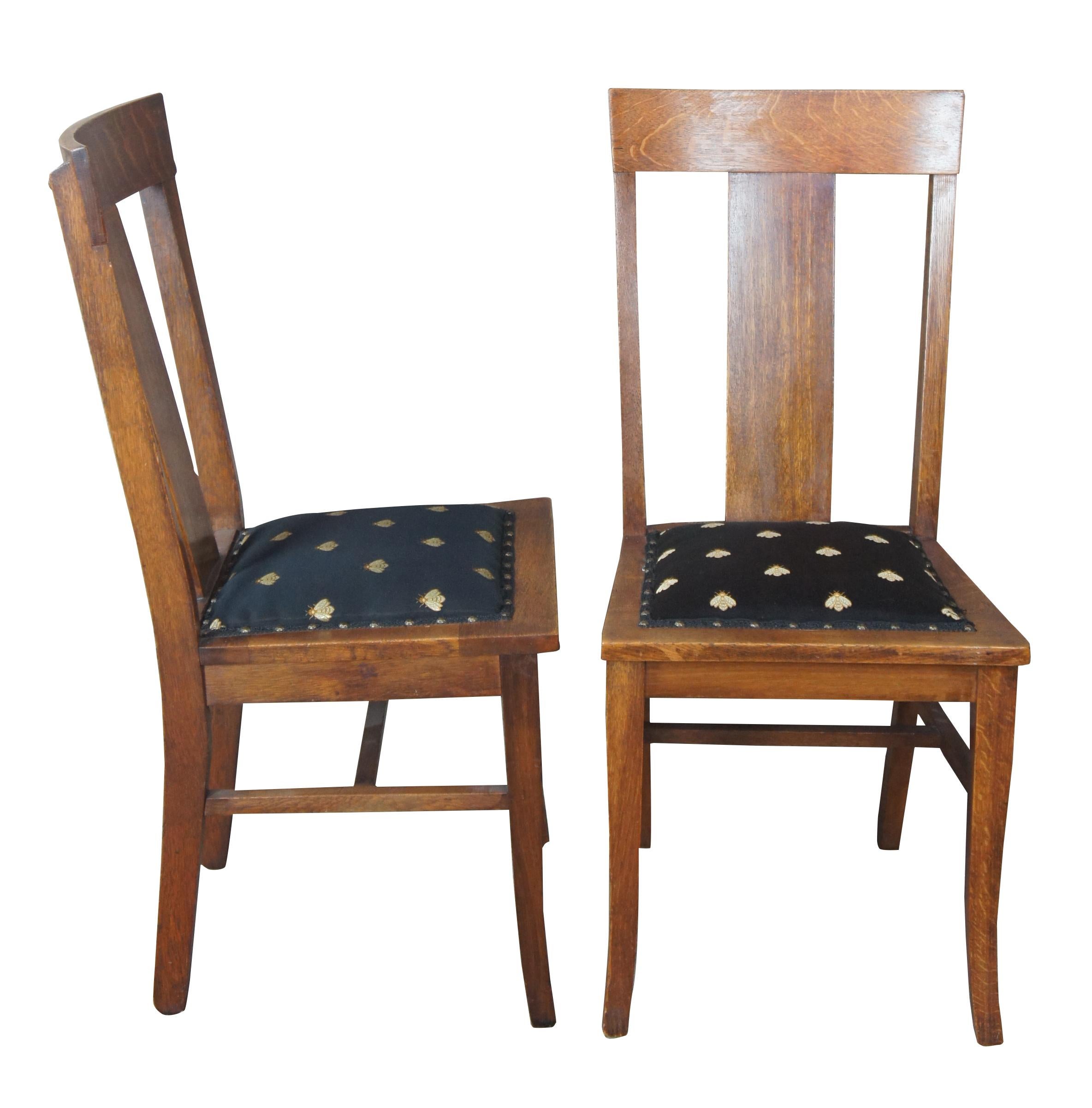 Six late Victorian dining chairs by National Furniture Company, circa 1900s. Made from oak with a quartersawn backing leading to insect (bee) pattern cushioned seats with nailhead trim. National Furniture Company was based out of Jamestown, New York