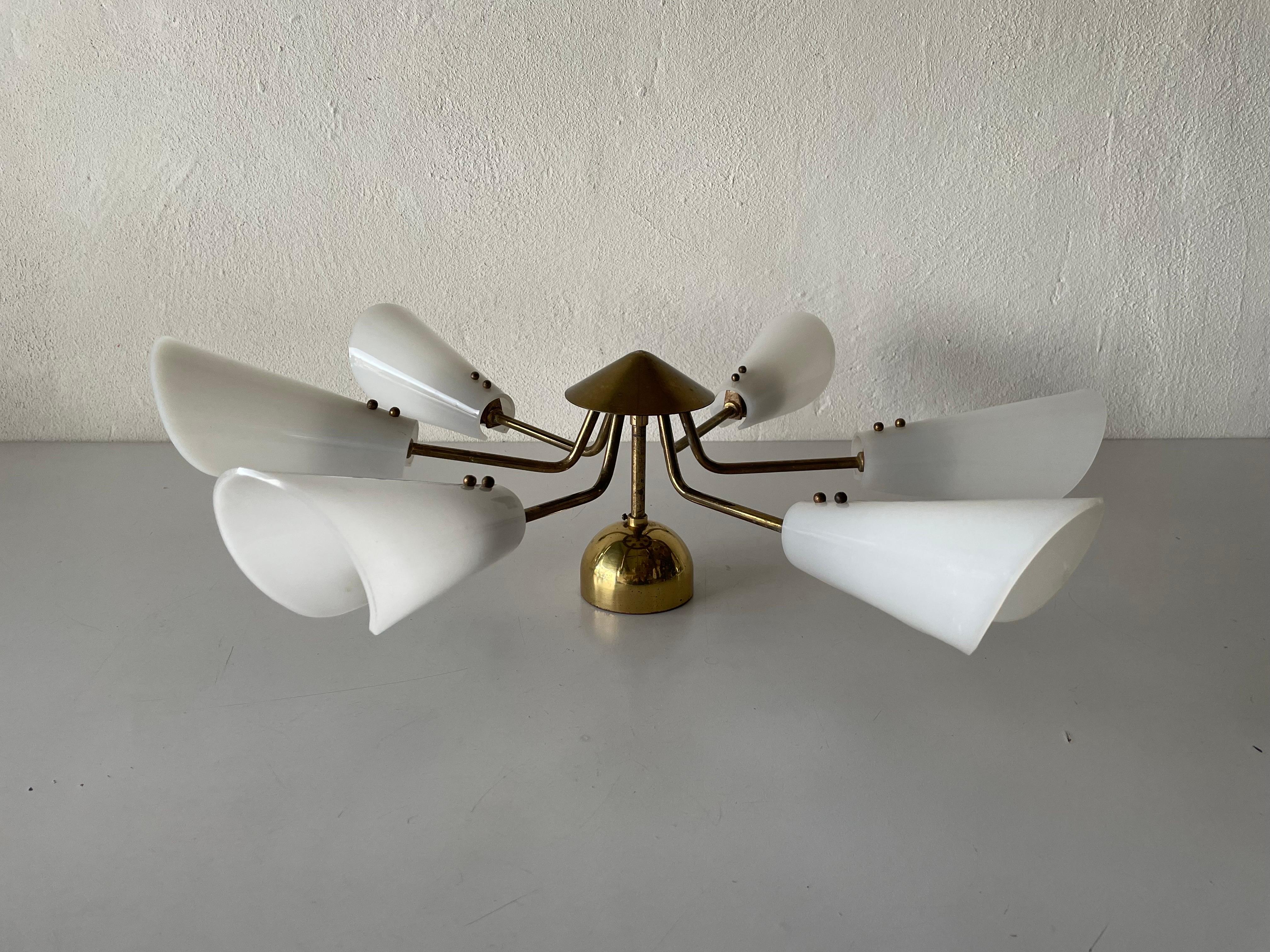 6-Armed metal sputnik ceiling light with plexiglass reflectors, 1960s, Germany.

Lampshade is in good condition and very clean. 

This lamp works with 6x E14 light bulbs. 
Wired and suitable to use with 220V and 110V for all