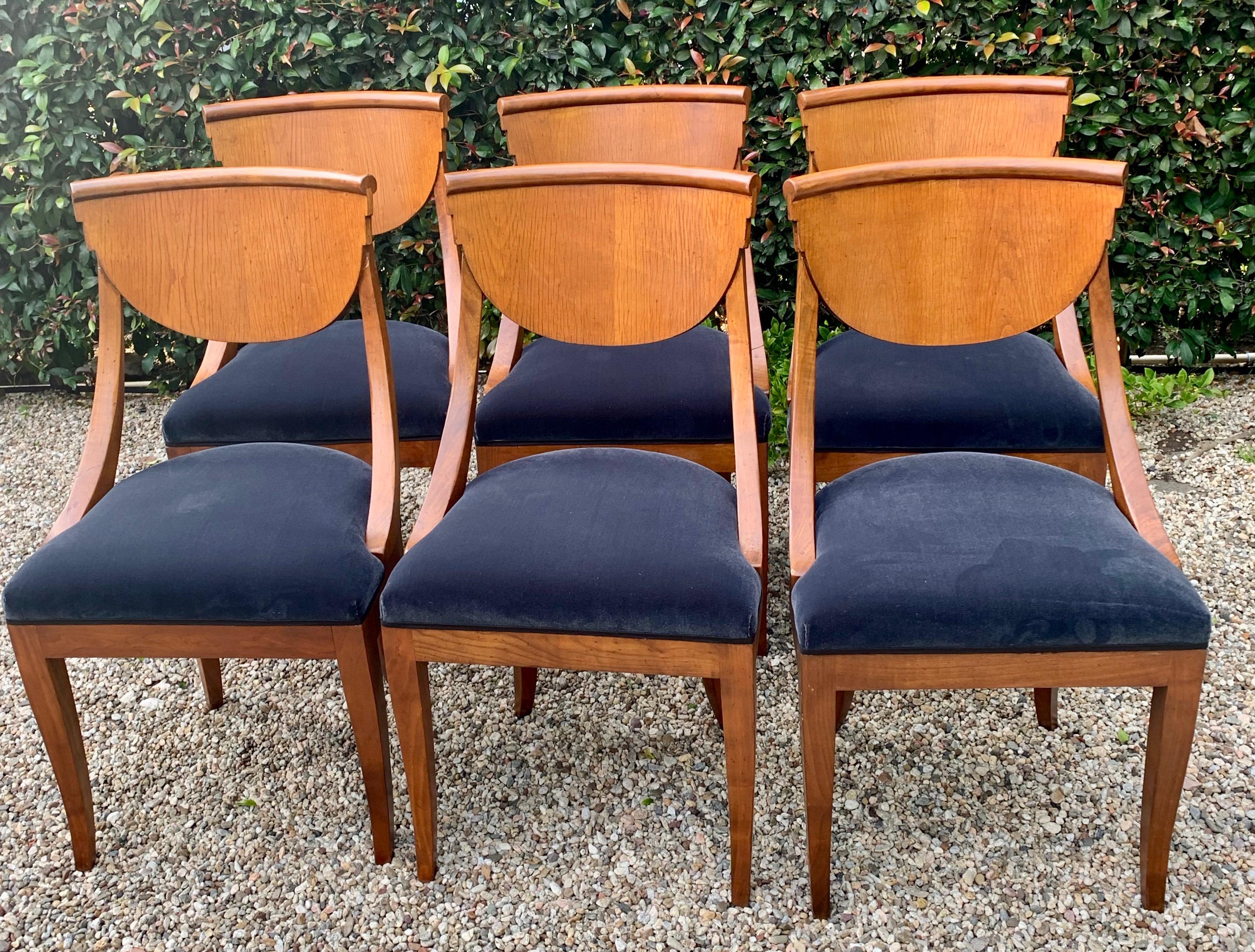 6 handsome satinwood maple deco dining chairs. Made in Italy and newly upholstered in a gray / blue Belgian velvet. We added a flat silk satin tuxedo ribbon, taking them from elegant and sophisticated too formal. Wonderful compliment to most dining