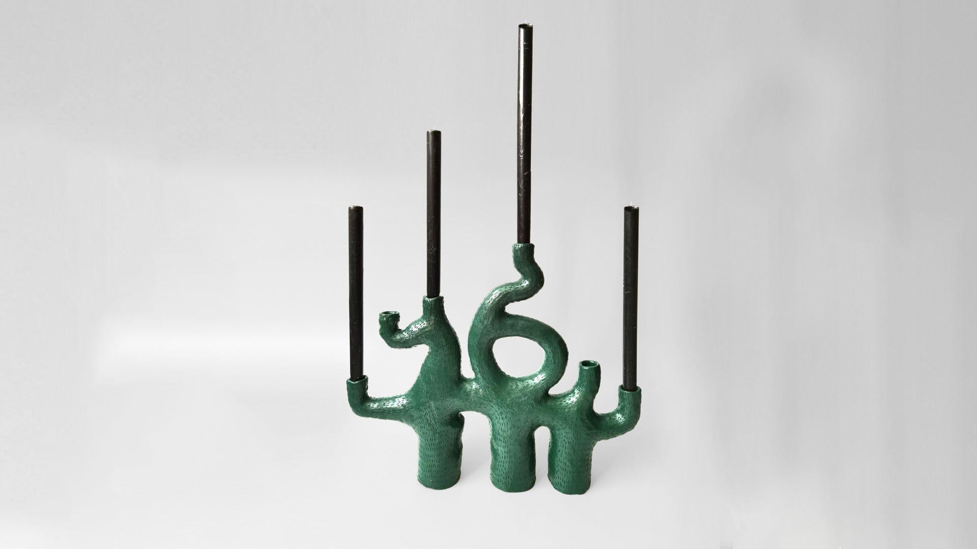 This coral inspired candelabra has 6 Arms and can hold up to 6 candles.
Although it is functional, the shape of this candelabra also suggests the curves of a sculpture. You can place it on your dinner table, coffee table, kitchen island,