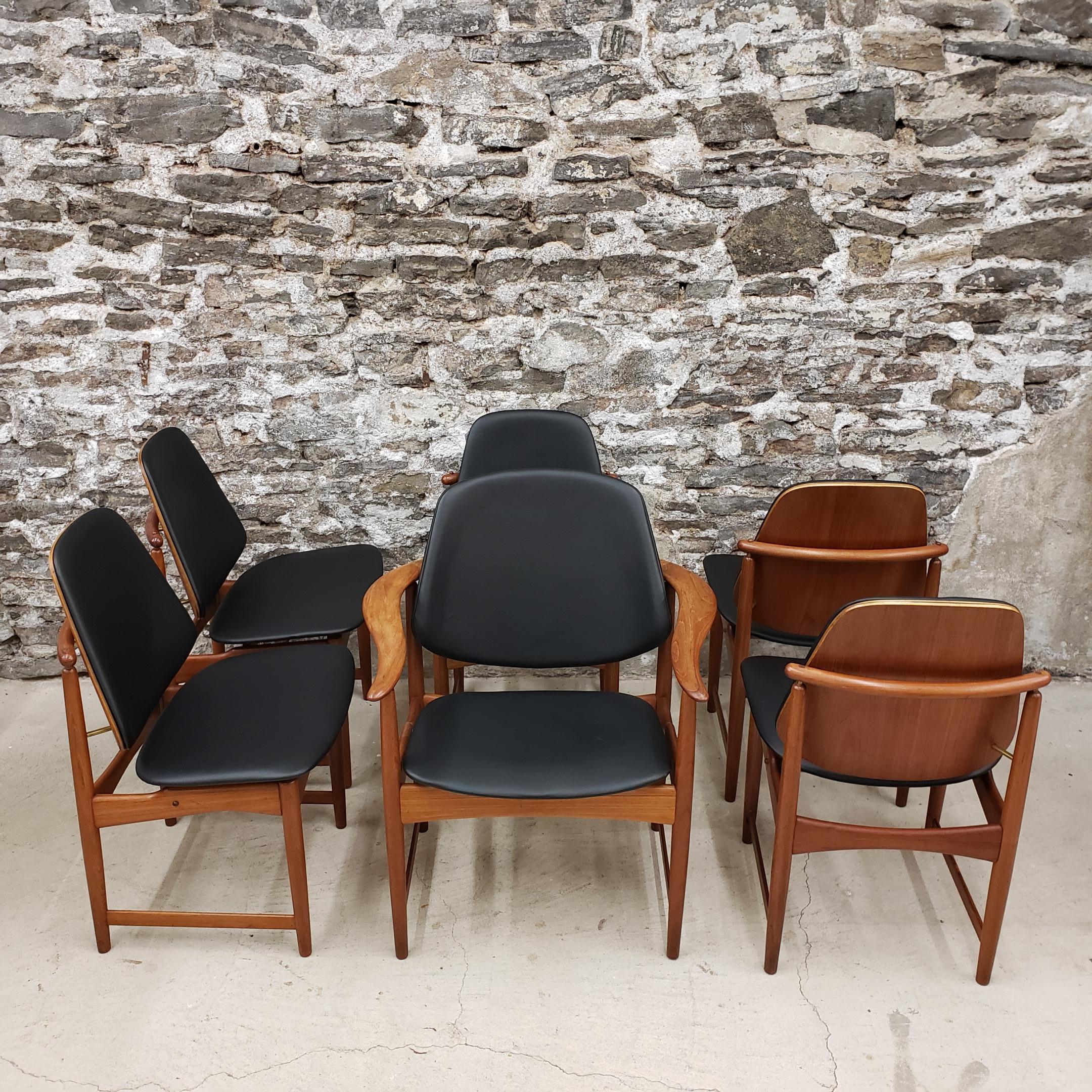 Set of six Danish teak dining chairs designed by Arne Hovmand-Olsen and produced by Onsild Møbelfabrik for Jutex, Århus in Denmark. Includes one captains chair and they've just been re-upholstered and the foam replaced. 

Scandinavian Modern /