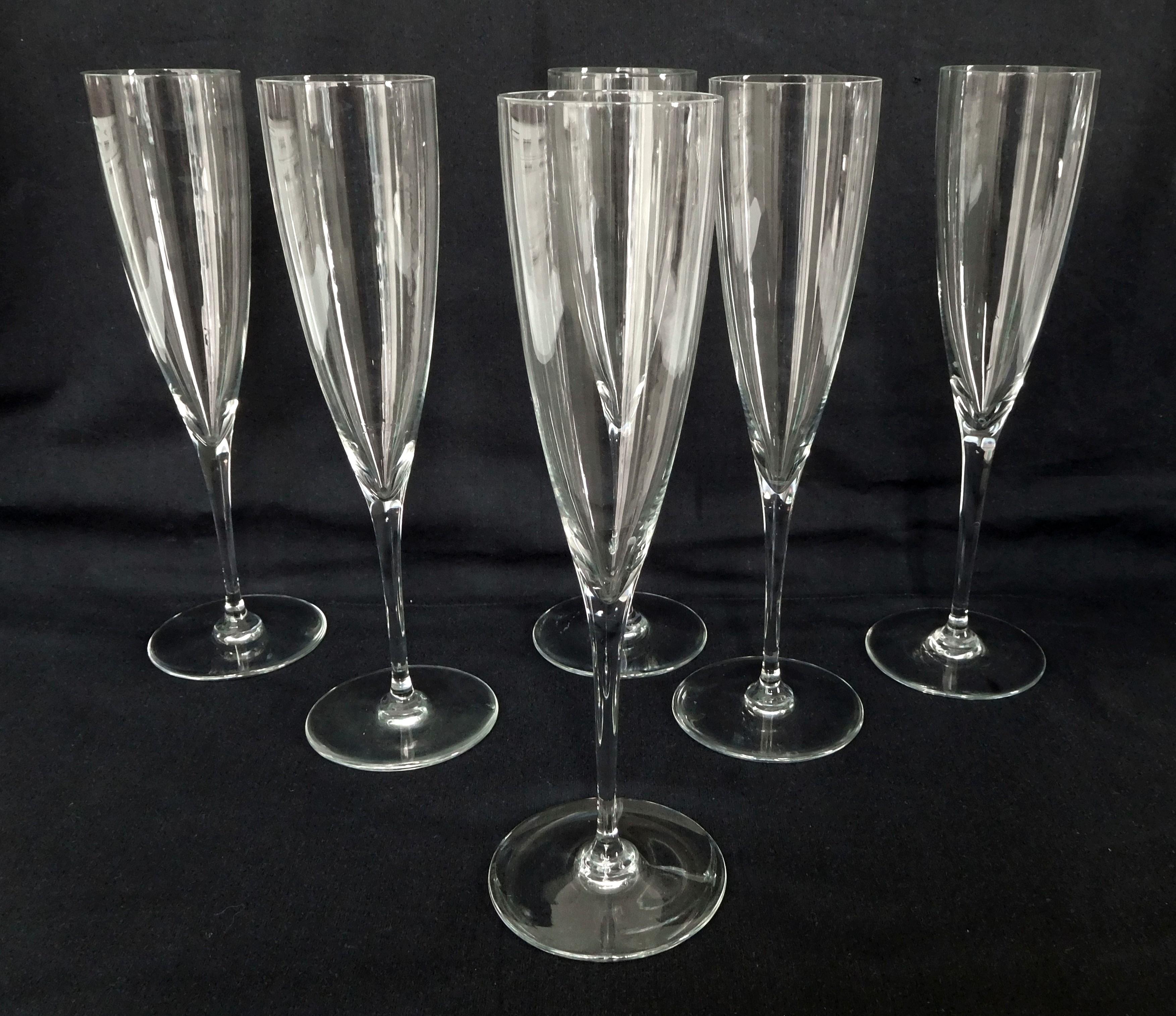Set of 6 Baccarat crystal champagne flutes, Dom Perignon pattern.
Dom Perignon model has been named after a French monk who was also a leading figure in oenology in the late 17th century / early 18th century.
Baccarat manufacture created Dom