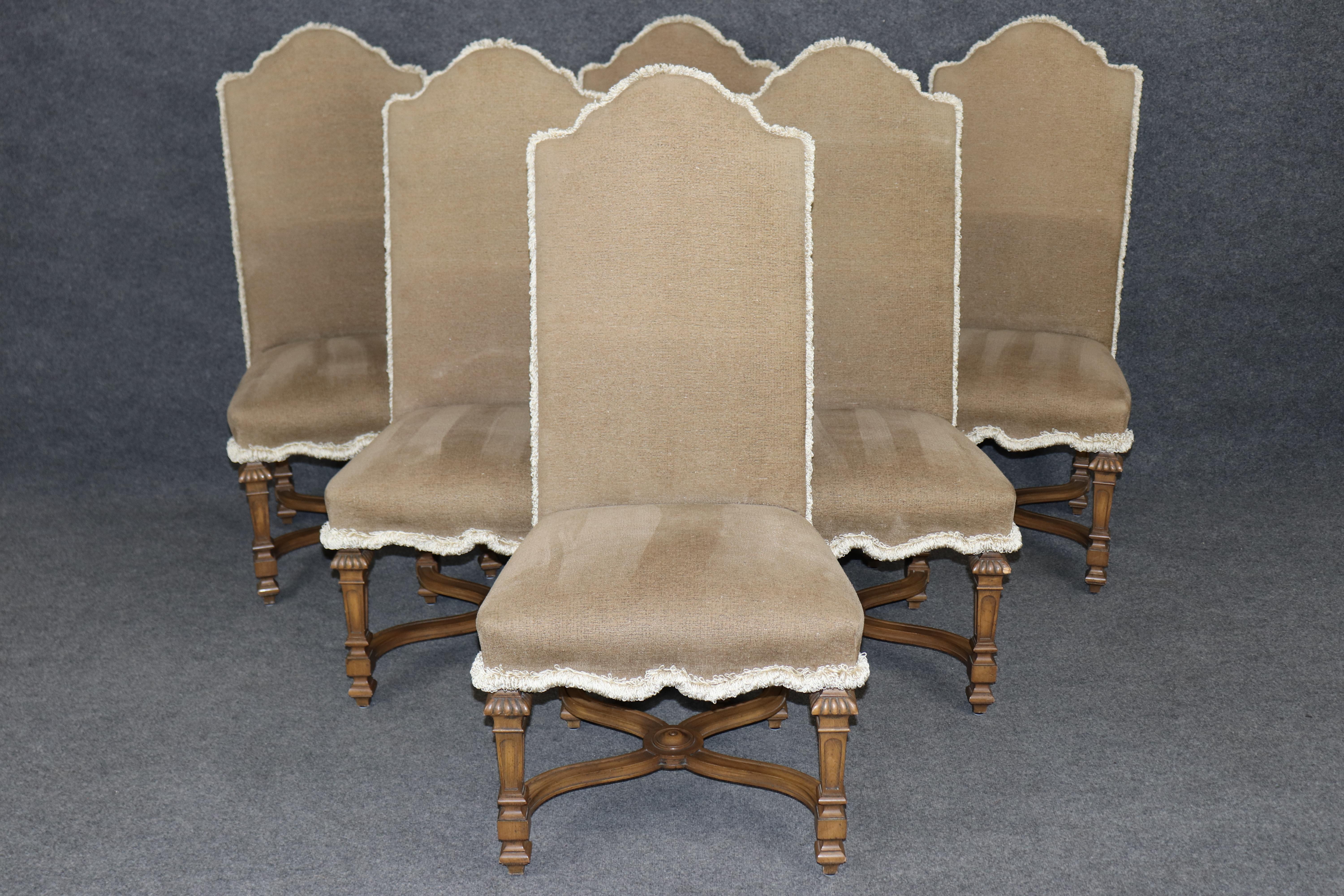 Dimensions - H: 44 in W: 22 in D: 25 1/4 in SH: 19 in

Bring the opulence and regal sophistication of the French Baroque period into your home with this exquisite set of six Louis XIV style dining chairs by Baker Furniture. Expertly crafted with an