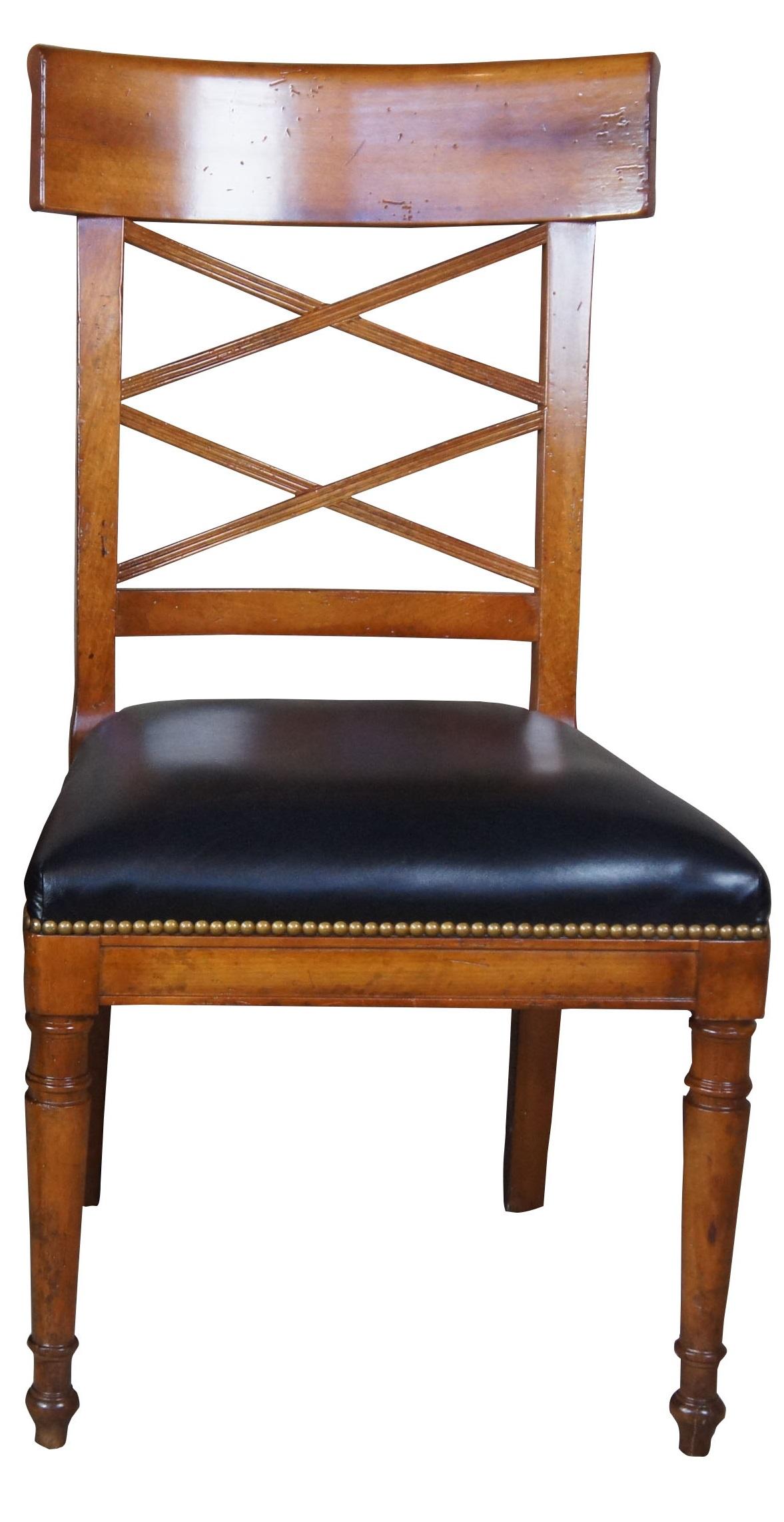 Milling Road for Baker (American, Grand Rapids, 1903-), late 20th century. Set of neoclassic walnut dining chairs, featuring a curved crest scroll arm rail, an open double X-form fluted lattice back, with molded aprons, tapering tuned legs, and