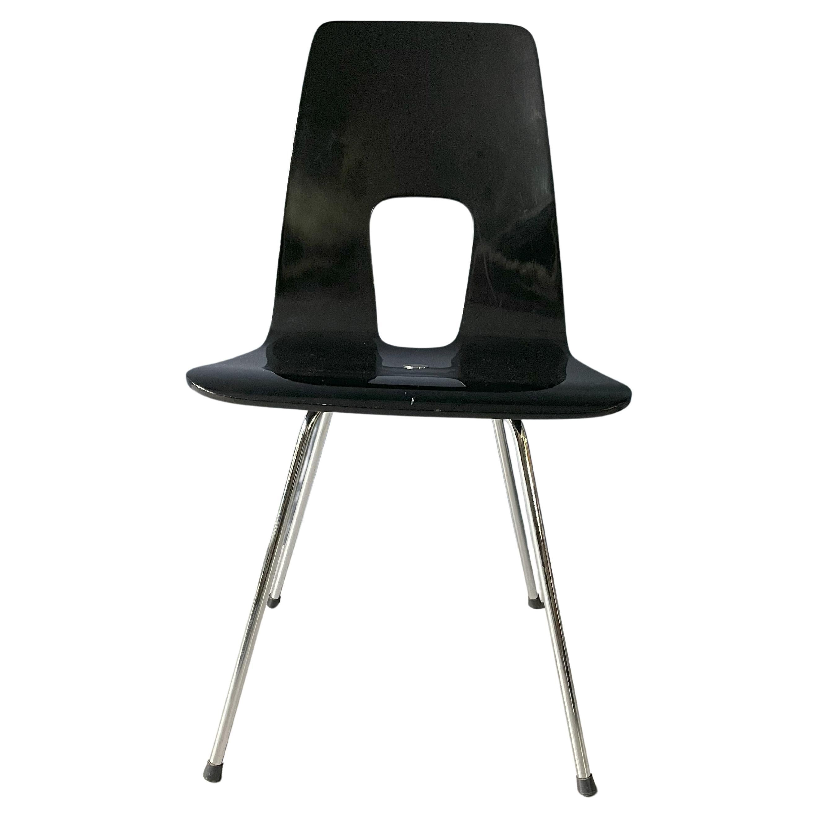A set of 6 "Einpunkt" black chairs, designed by Hans Bellmann
