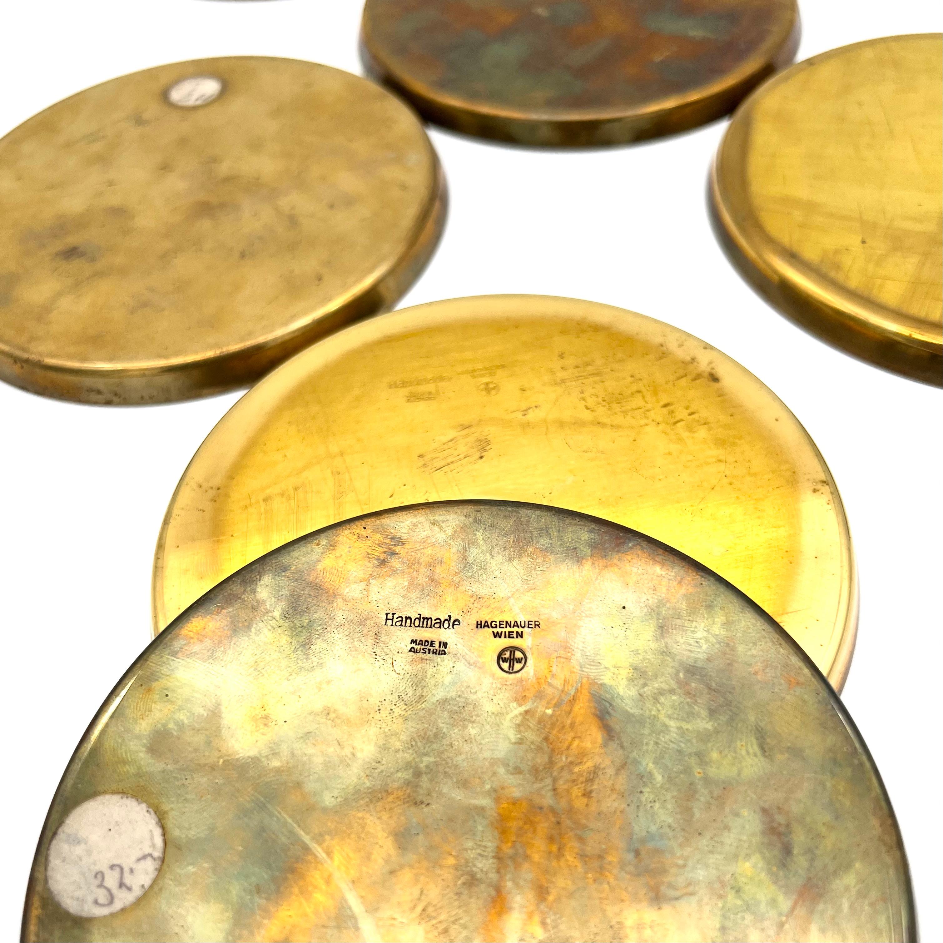 6 brass coasters by Hagenauer, 1950s, the surface is a bit brassing but they are in good condition.