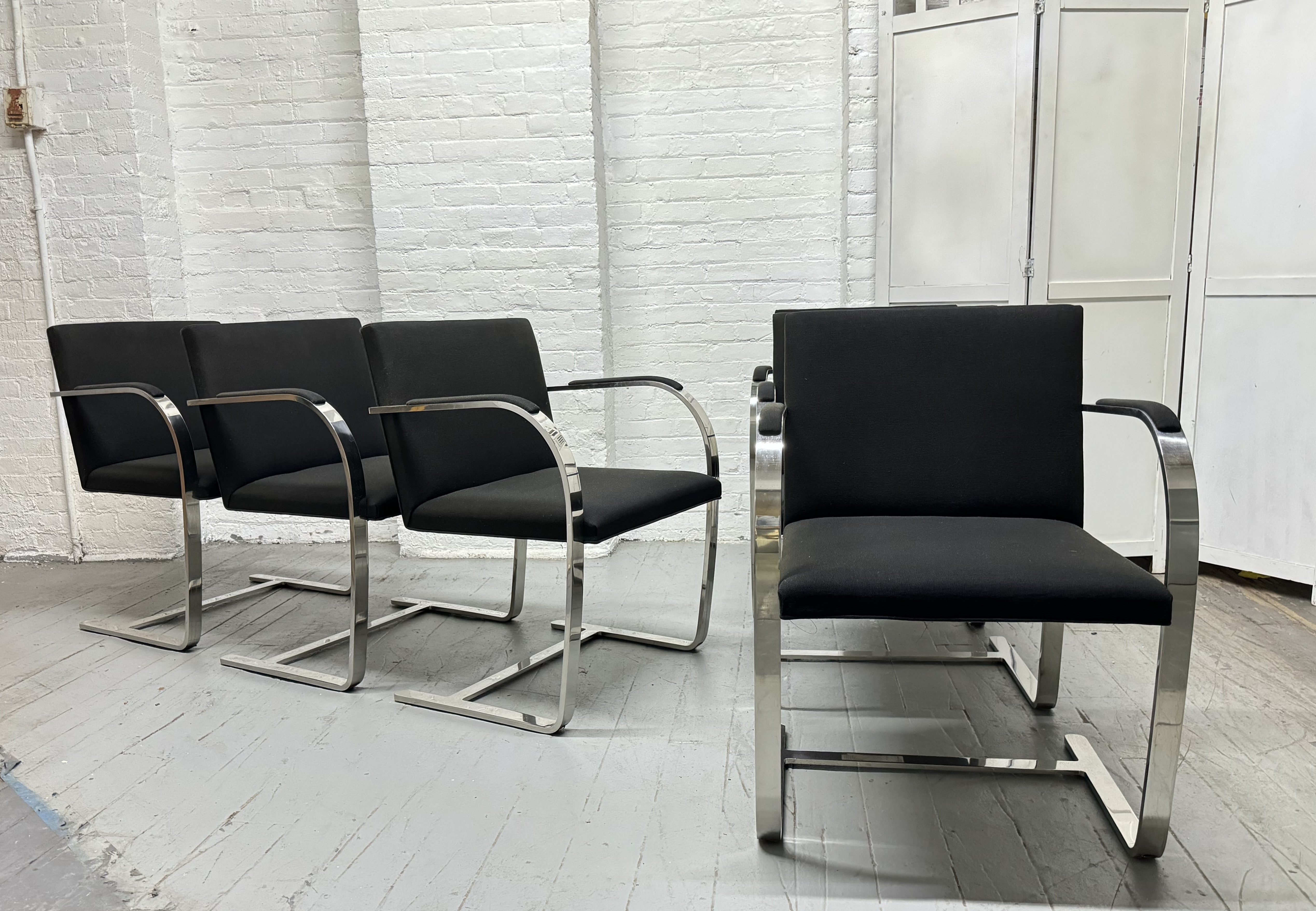 Set of 6 Mies Van Der Rohe BRNO Flat Bar Chairs for Knoll International.  The chairs have chromed steel frames with upholstered seats and padded arms.  