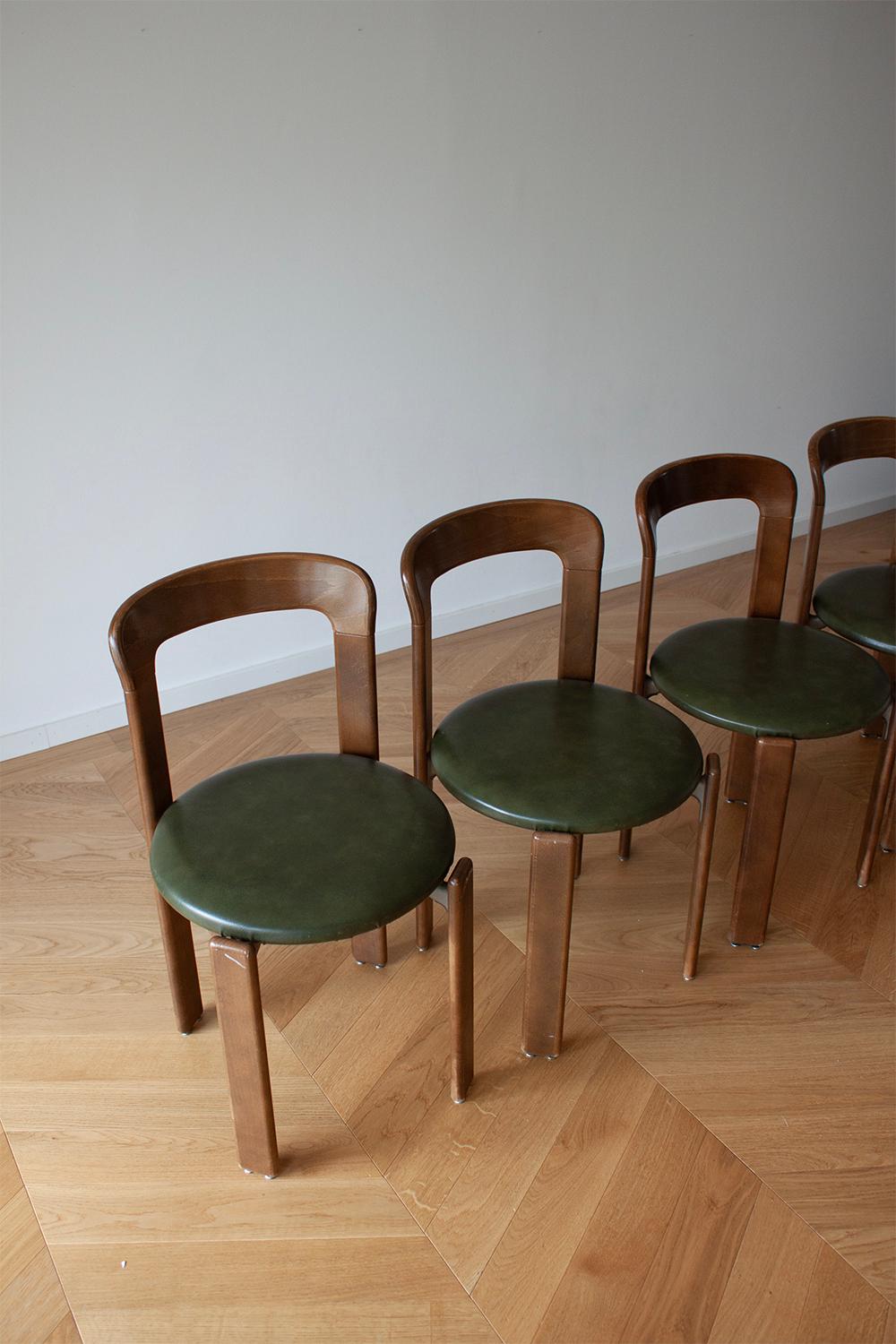 Swiss 4 Bruno Rey Dining Chairs in Dark Wood with Green Leather Seat by Dietiker