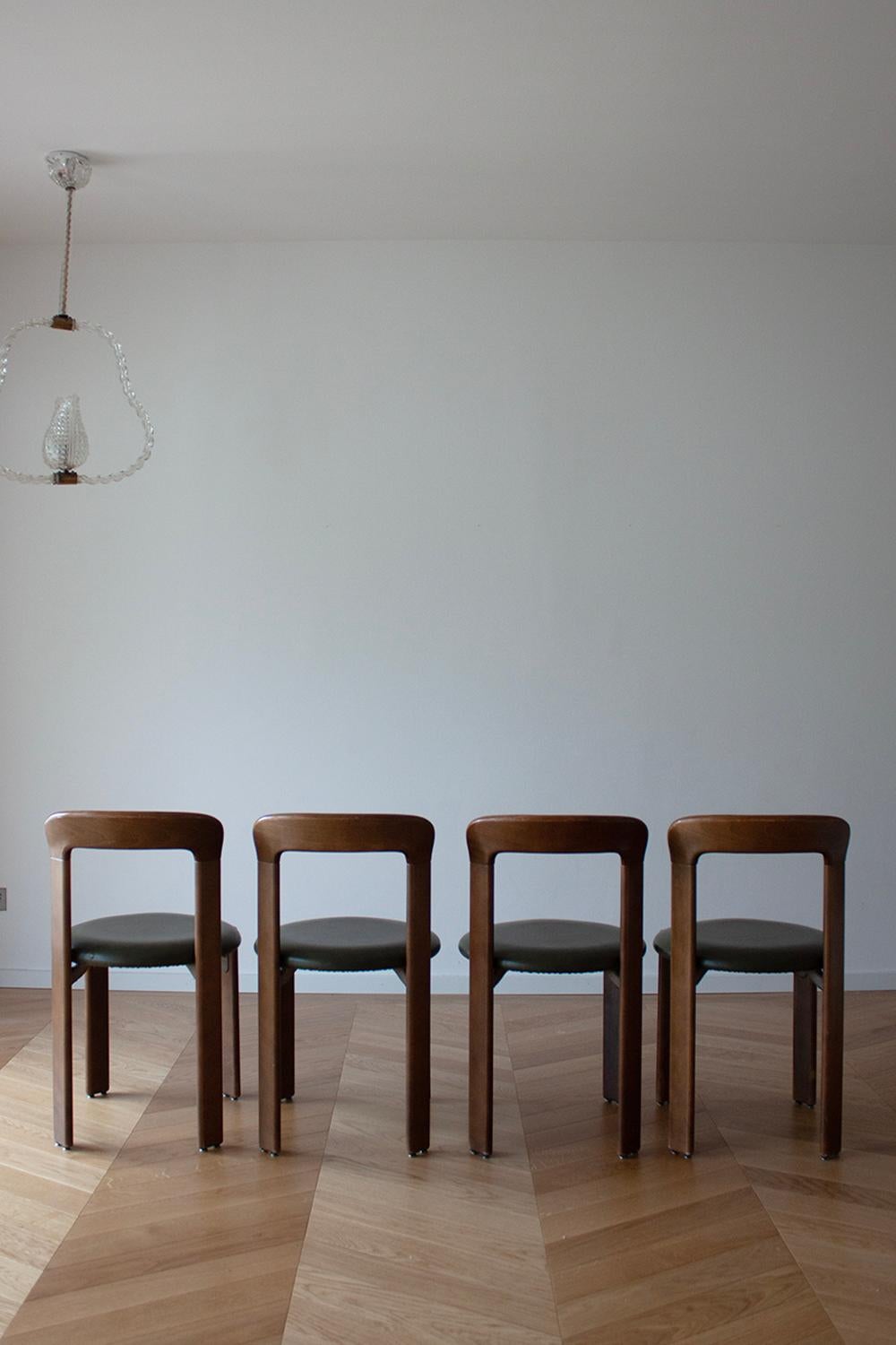 Machine-Made 4 Bruno Rey Dining Chairs in Dark Wood with Green Leather Seat by Dietiker