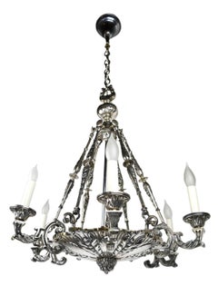 Lustre à 6 bougies en métal argenté