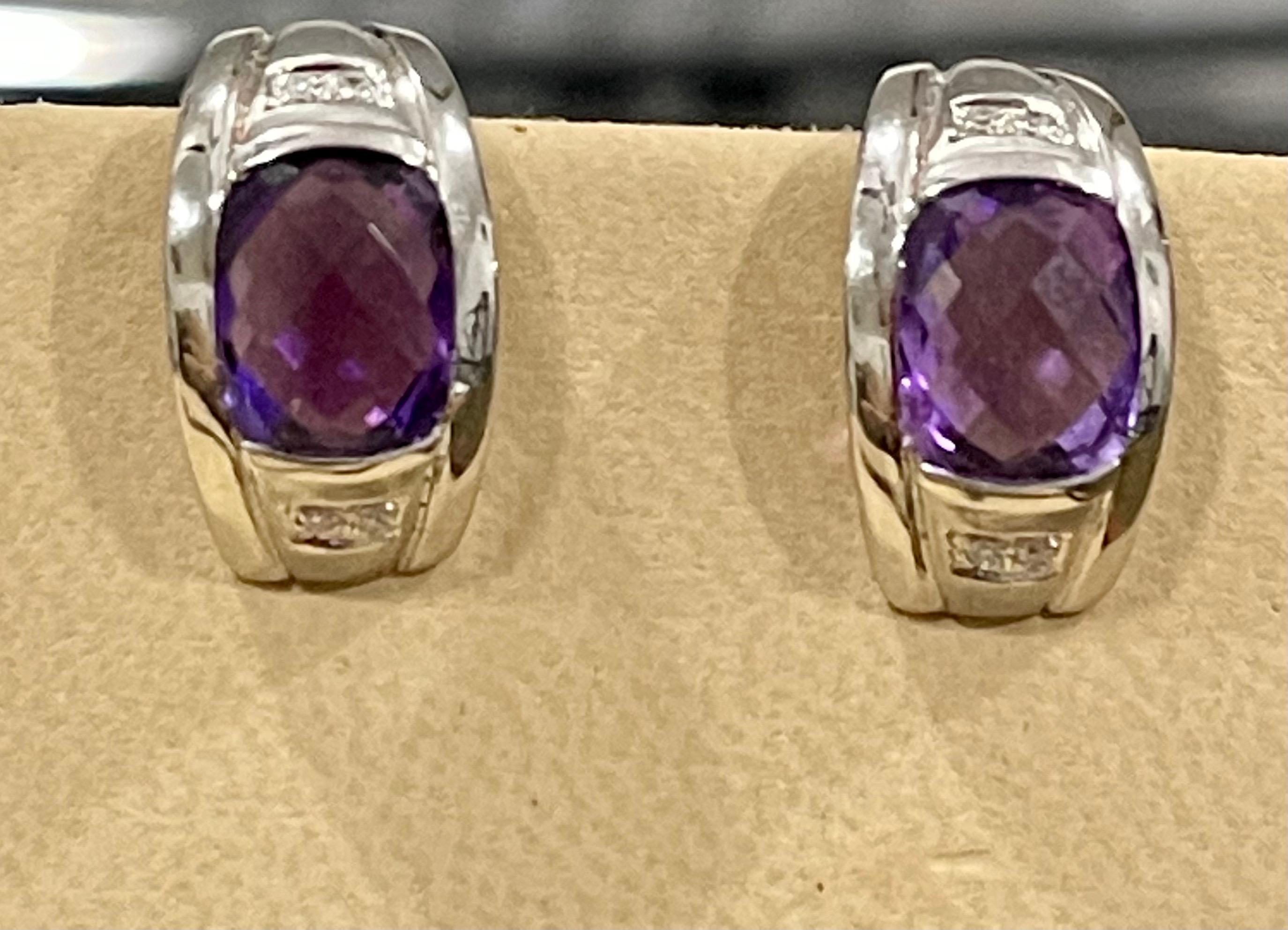 6 Carat Amethyst and Diamond 14 Karat White Gold Earrings, Omega Back
Beautiful pair of earrings  finely crafted in  14 Karat  solid White gold.
Very desirable color and quality.
perfect pair made in 14 Karat White  gold
total weight 8.3 