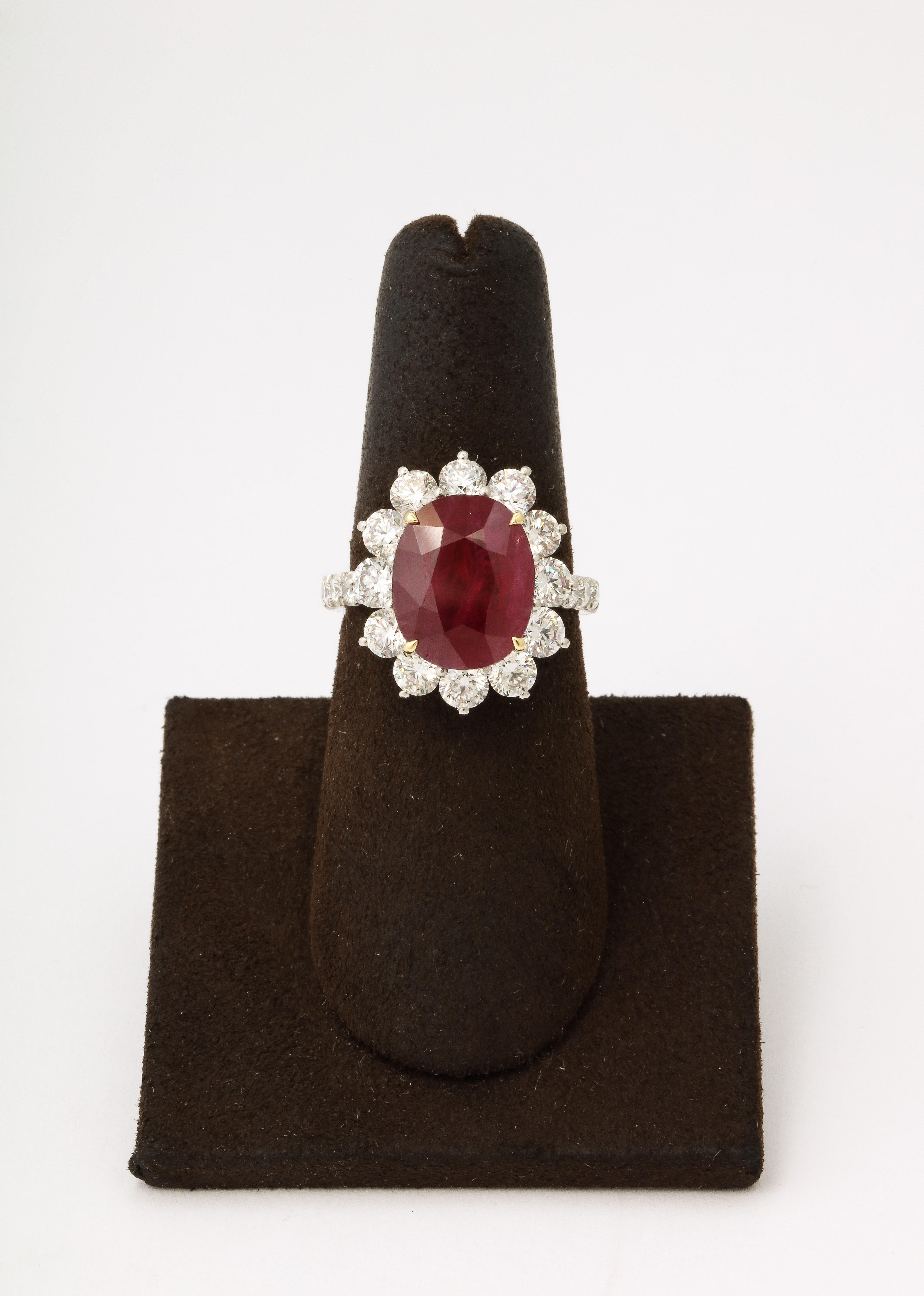 
A Fabulous Ruby and rare find! 

6.15 carat certified Burma Ruby with Fine color and Luster. 

2.32 carats of white round brilliant cut diamonds. 

Set in platinum 

Currently a size 6.5, this ring can easily be resized. 

Certified by Christian