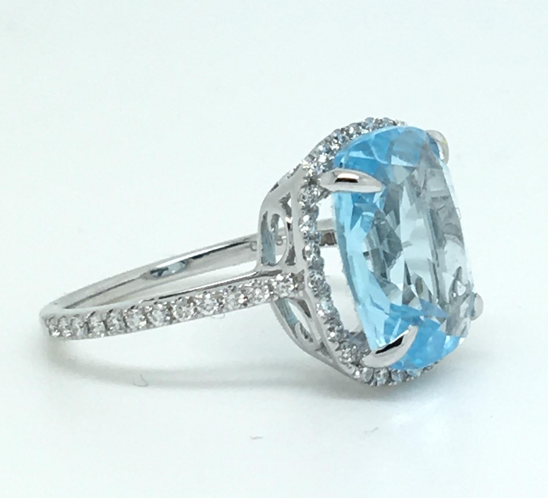 6 Carat Cushion Blue Topaz 18 Karat White Gold 0.38 Carat Diamond Halo Ring For Sale 1