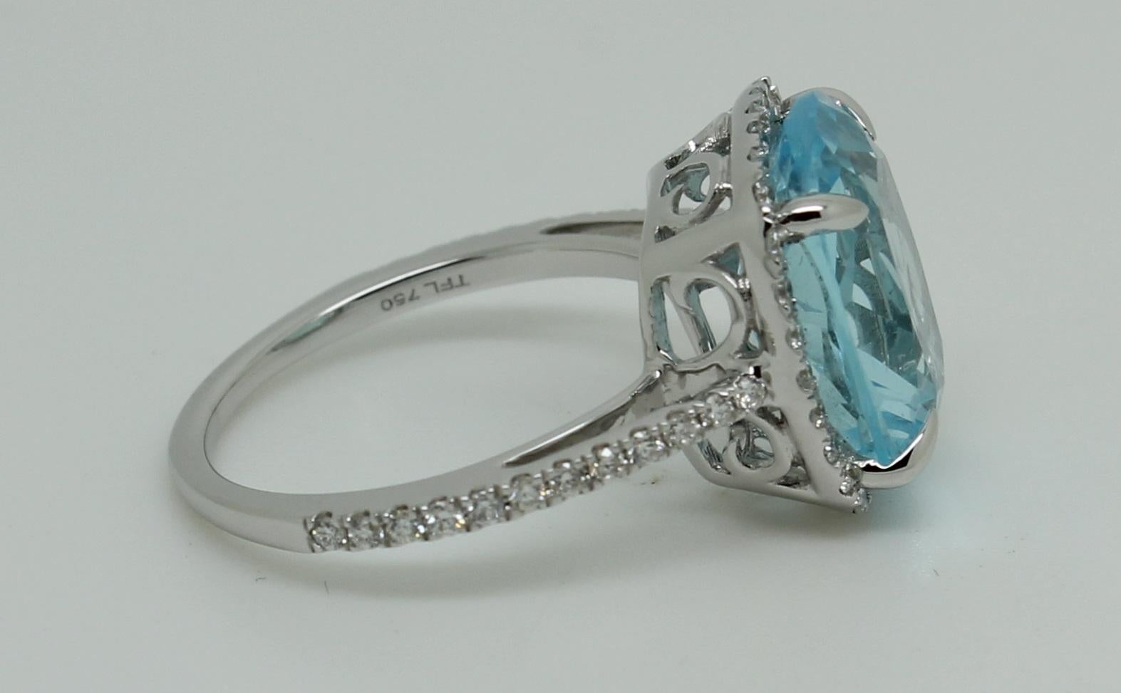 6 Carat Cushion Blue Topaz 18 Karat White Gold 0.38 Carat Diamond Halo Ring For Sale 6