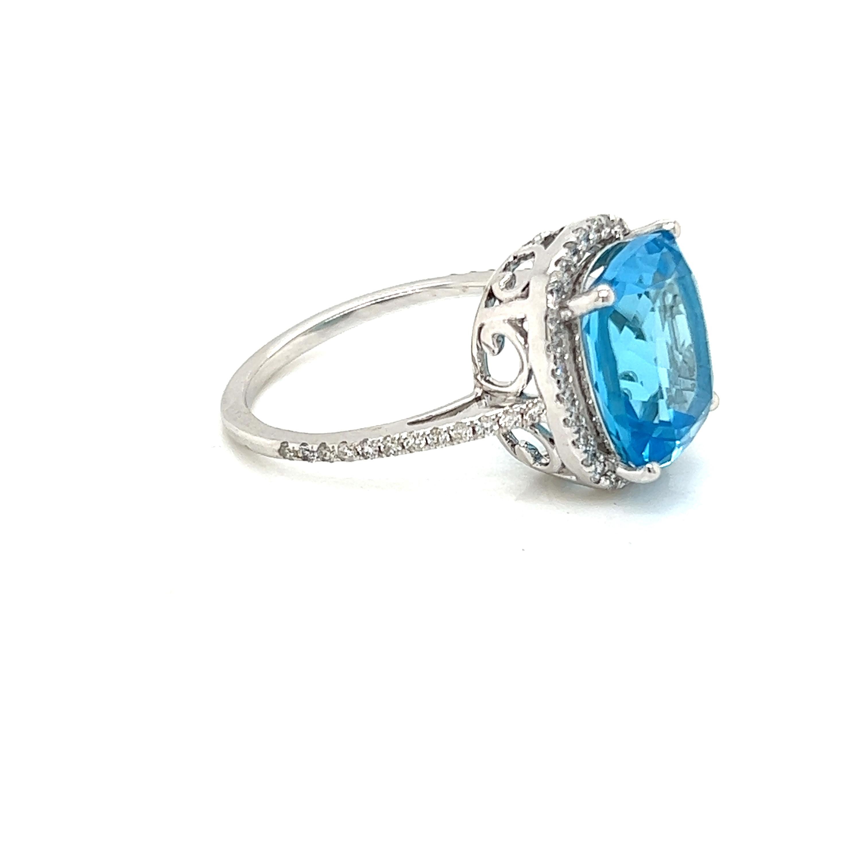 6 Carat Cushion Blue Topaz 18 Karat White Gold 0.38 Carat Diamond Halo Ring For Sale 9