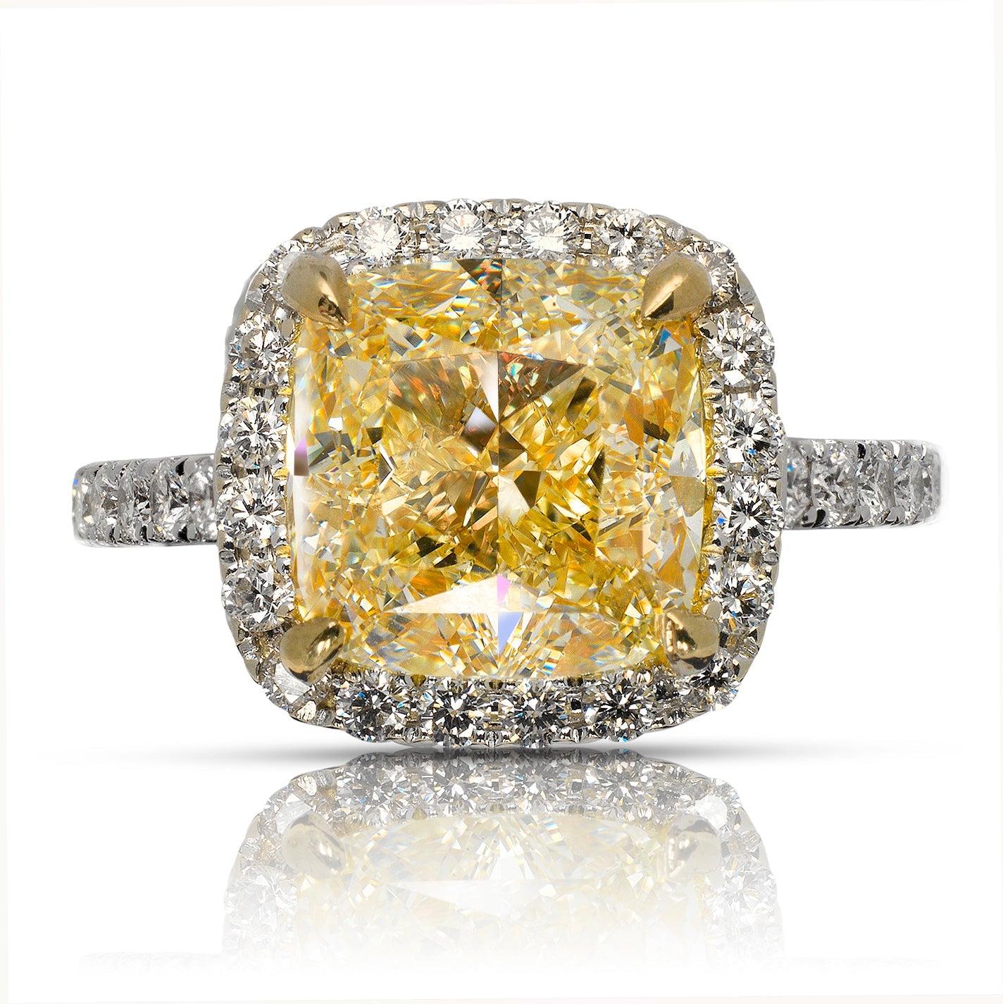 YSE -CUSHION CUT  YELLOW DIAMOND ENGAGEMENT RING BY MIKE NEKTA
GIA CERTIFIED

Center Diamond:
Carat Weight: 5 Carats
Color : W
Style: CUSHION CUT
Approximate Measurements: 9.2 x 9.0 x 6.4 mm 
 
Ring:
Metal: 18K WHITE GOLD 
Style: HALO DIAMOND