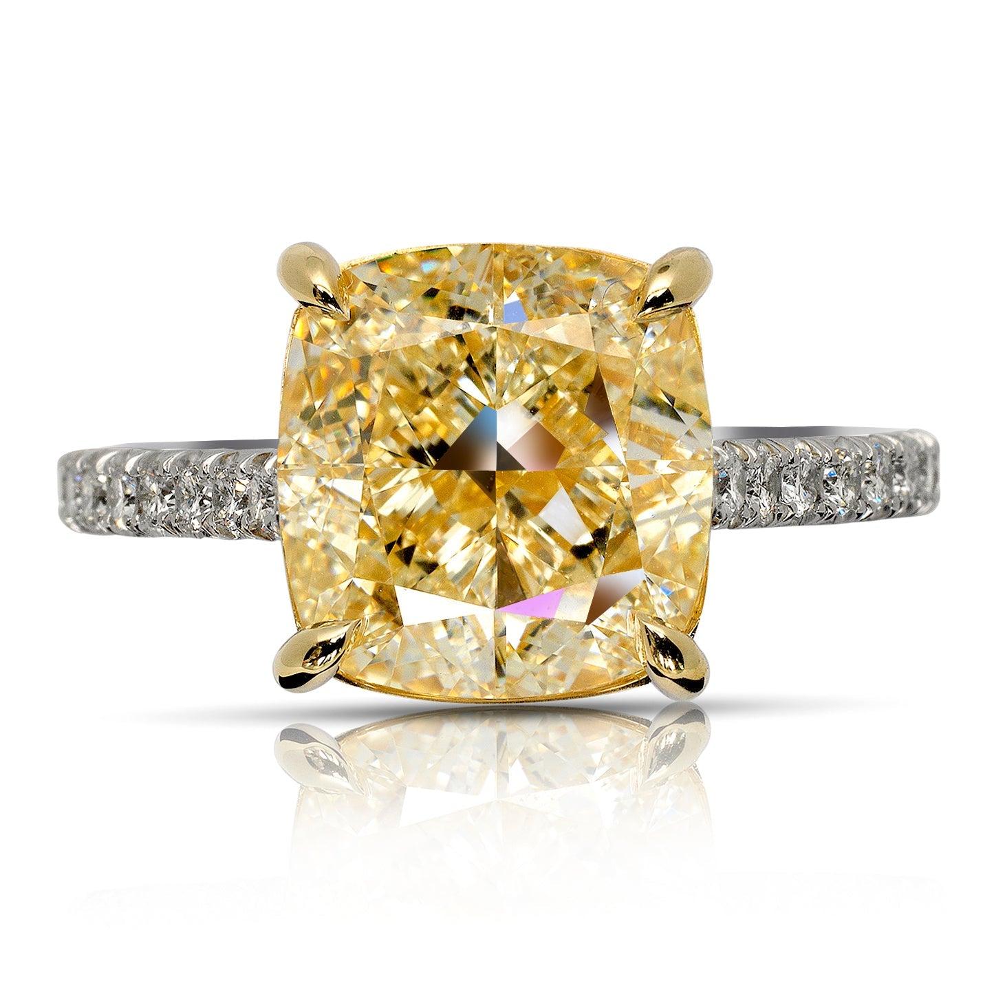 MEG CUSHION CUT YELLOW DIAMOND ENGAGEMENT RING BY MIKE NEKTA
Center Diamond:

GIA CERTIFIED
Carat Weight: 5 Carats
Color:  W TO X RANGE 
Clarity: VS1
Style:  CUSHION MODIFIED BRILLIANT
Approximate Measurements:  9.3 x 8.9 x 6.4 mm 
 
Ring:
Metal: