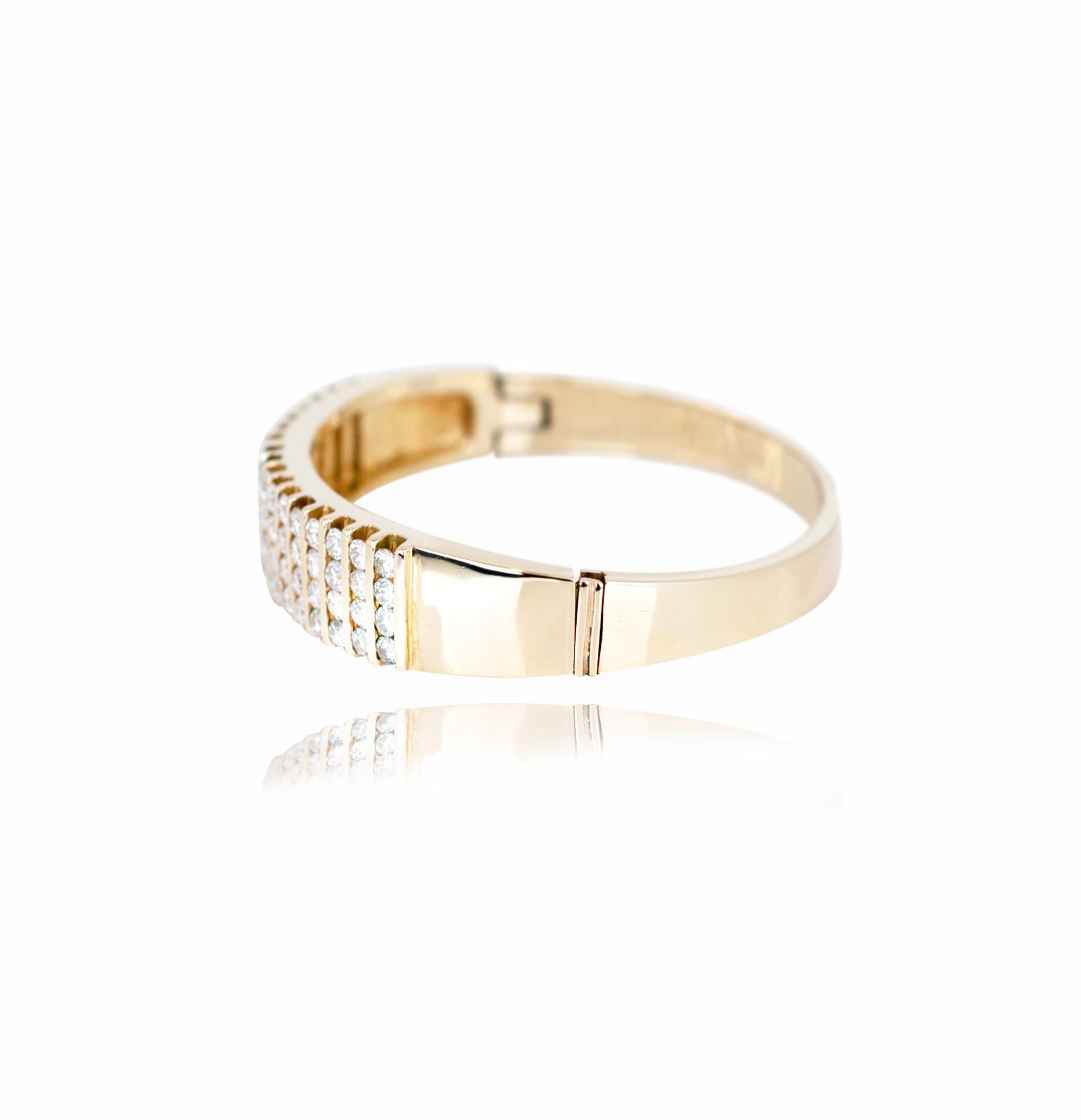 This staple diamond bar bracelet is perfect for in the yellow gold accessories.  Keeping with trends and staple pieces of jewelry that would improve nearly anyone's jewelry collection.  This bracelet is a perfect balance of white diamonds and yellow