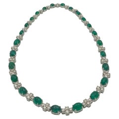 Collana in oro bianco 18 carati con diamante da 6 carati e smeraldo a cabochon