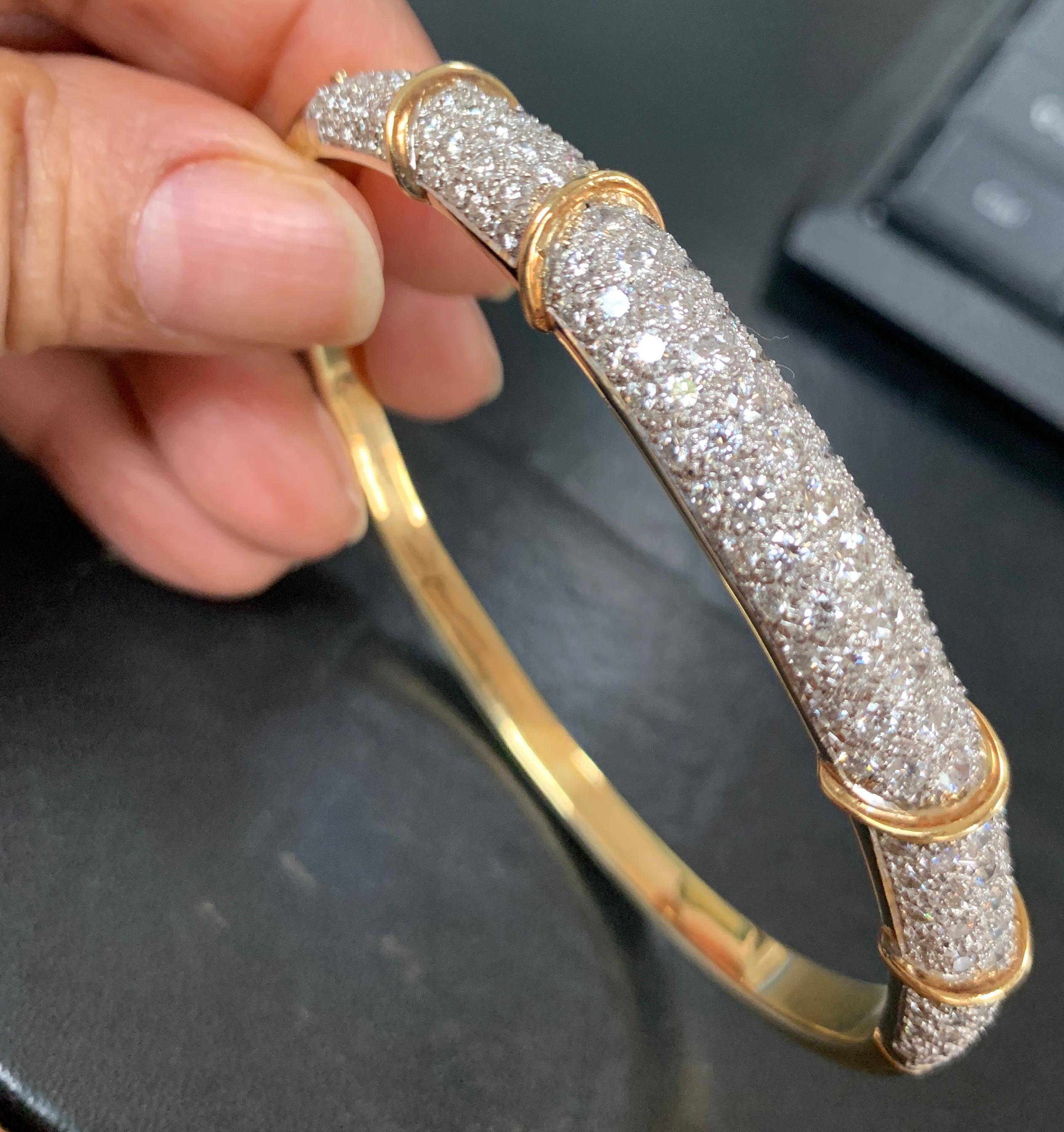 6 Carat Diamond Large Bangle /Bracelet in 18 Karat Yellow Gold 36 Grams
It features a bangle style  Bracelet crafted from  18 karat Yellow gold and embedded with   total approximately 6 Carats with  Round brilliant diamonds  . 
Open from one side