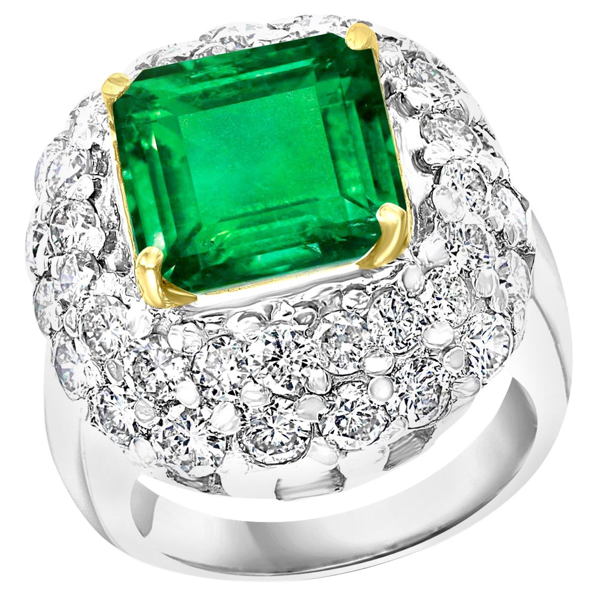 6 Carat Emerald Cut Colombian Emerald and 4 Carat Diamond Ring Platinum Two-Tone