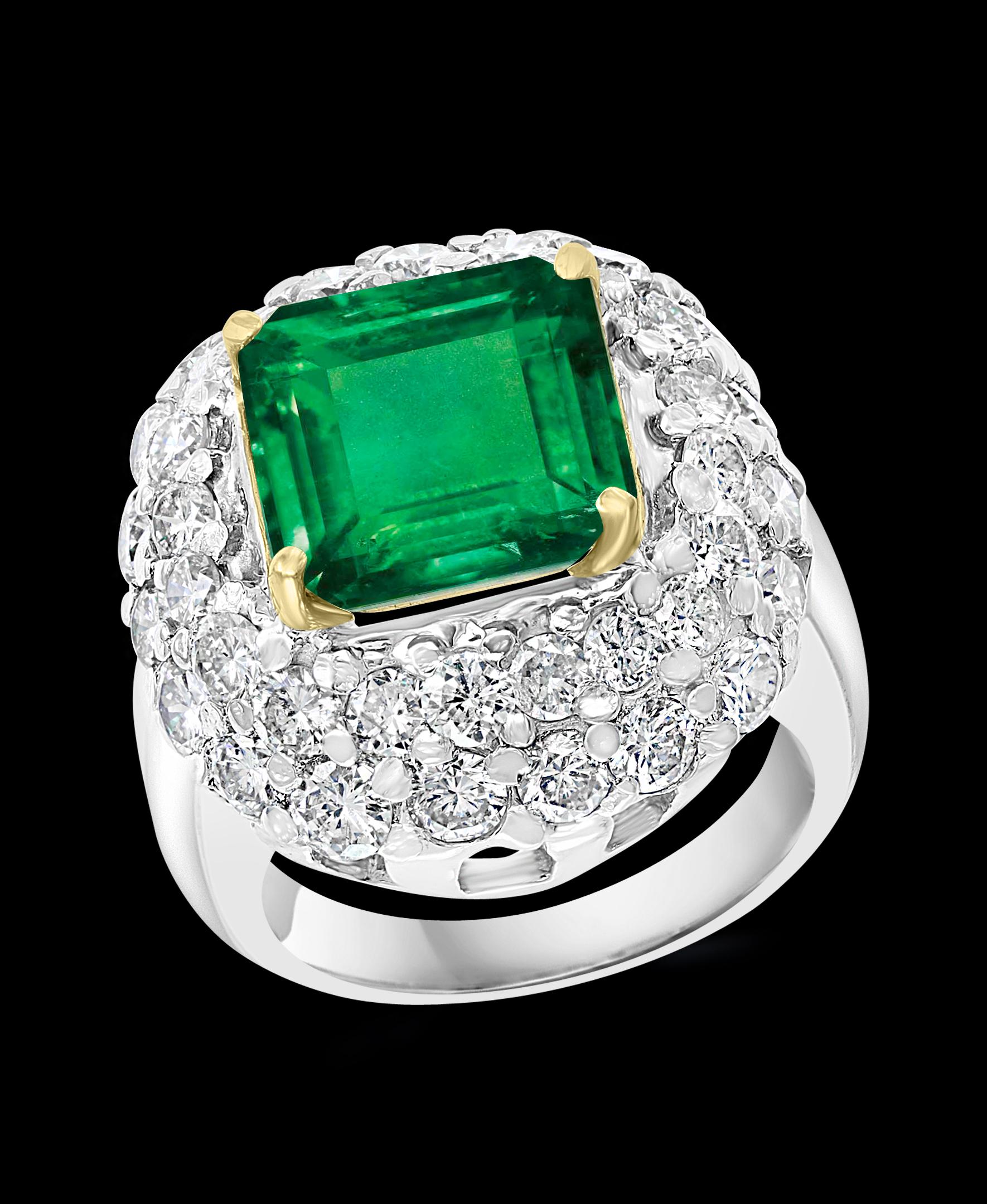 Women's 6 Carat Emerald Cut Colombian Emerald and 4 Carat Diamond Ring Platinum Two-Tone