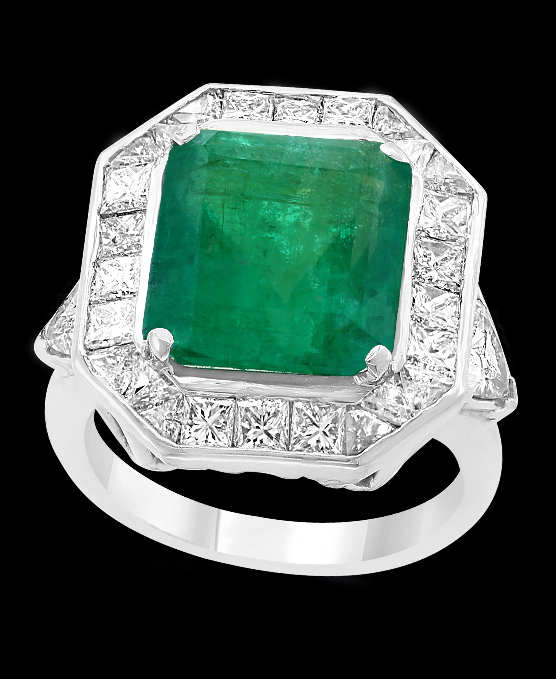 A classic, Cocktail ring 
6 + Carat  Colombian Emerald and Diamond Ring, Estate with a color and clarity of F/G and VS1/VS2, respectively with no color enhancement.
Gold: 18 carat white gold 
Weight: 8 gram Diamonds: approximate 2.2 Carat princess