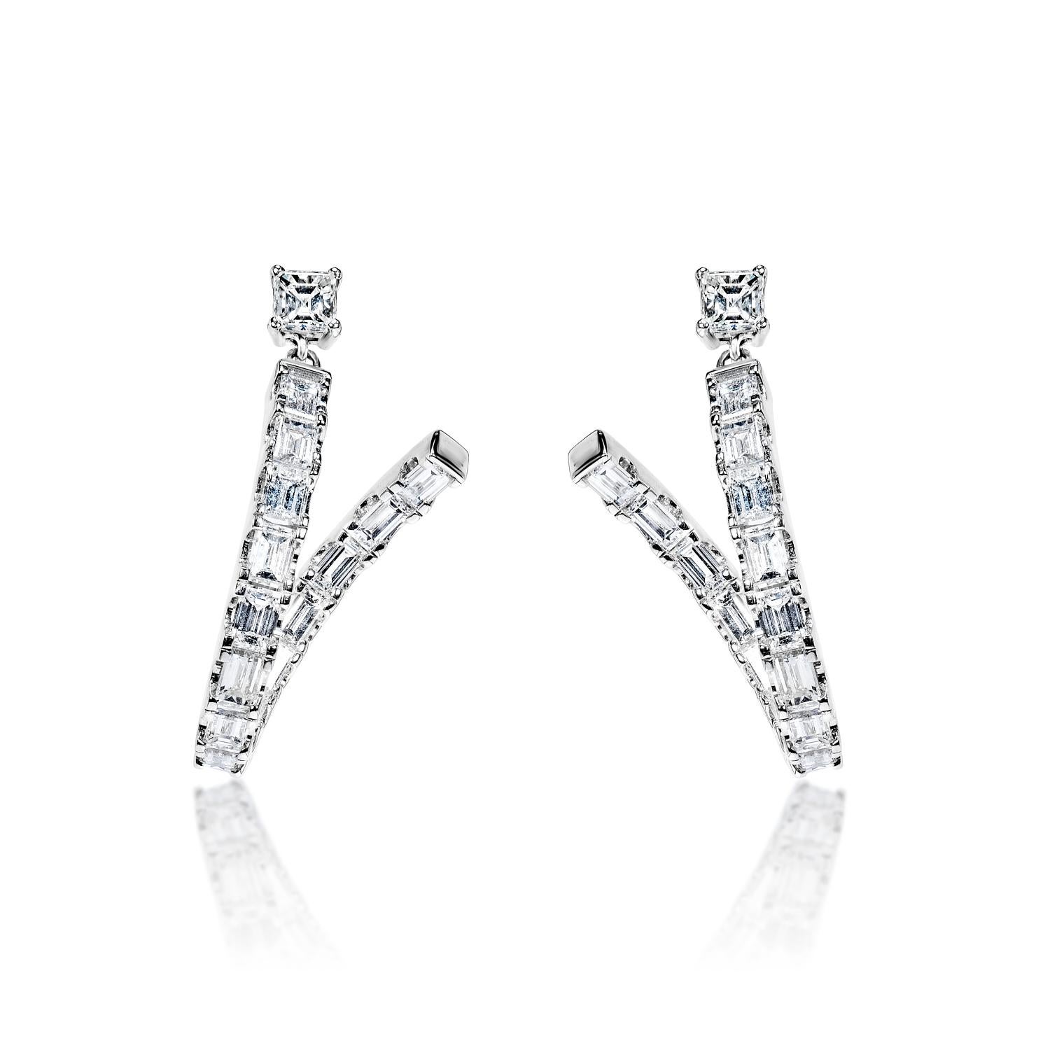 Diamond Dangle Earrings For Ladies:

Main Diamonds:
Carat Weight: 5.73 Carats
Shape: Emerald Cut

Metal: 18 Karat White Gold
Metal Weight: 9.10 grams
Style: Dangle Earrings

Total Carat Weight: 5.73 Carats