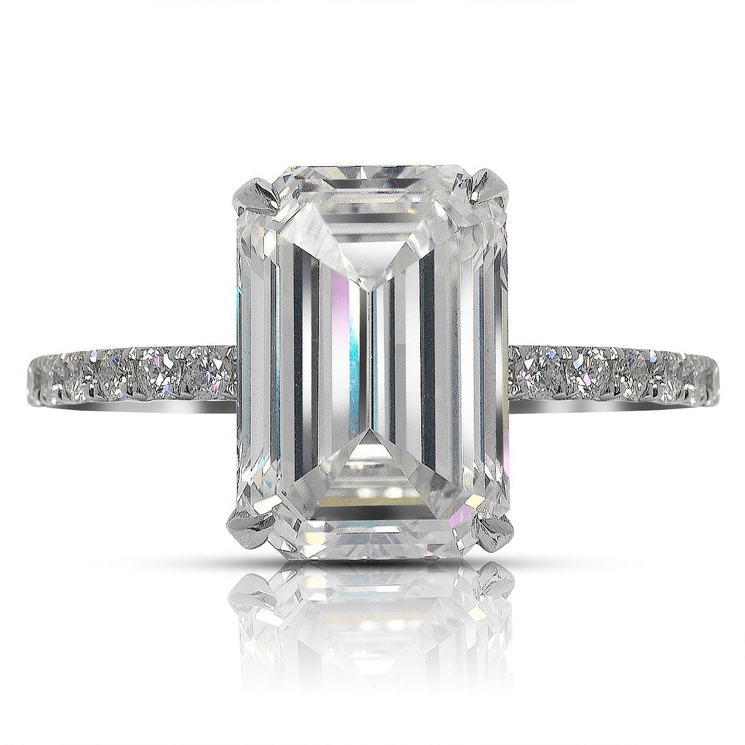 RONI EMERALD CUT  DIAMOND ENGAGEMENT RING PLATINUM
GIA CERTIFIED
 
Center Diamond
Carat Weight: 5.10 Carats
Color :   I*
Clarity:  VVS2
Cut: EMERALD CUT
Measurements: 12.2 x 8.46 x 5.0 mm
*Color Treated
 
Ring:
Metal: PLATINUM
Style: 4 PRONG
