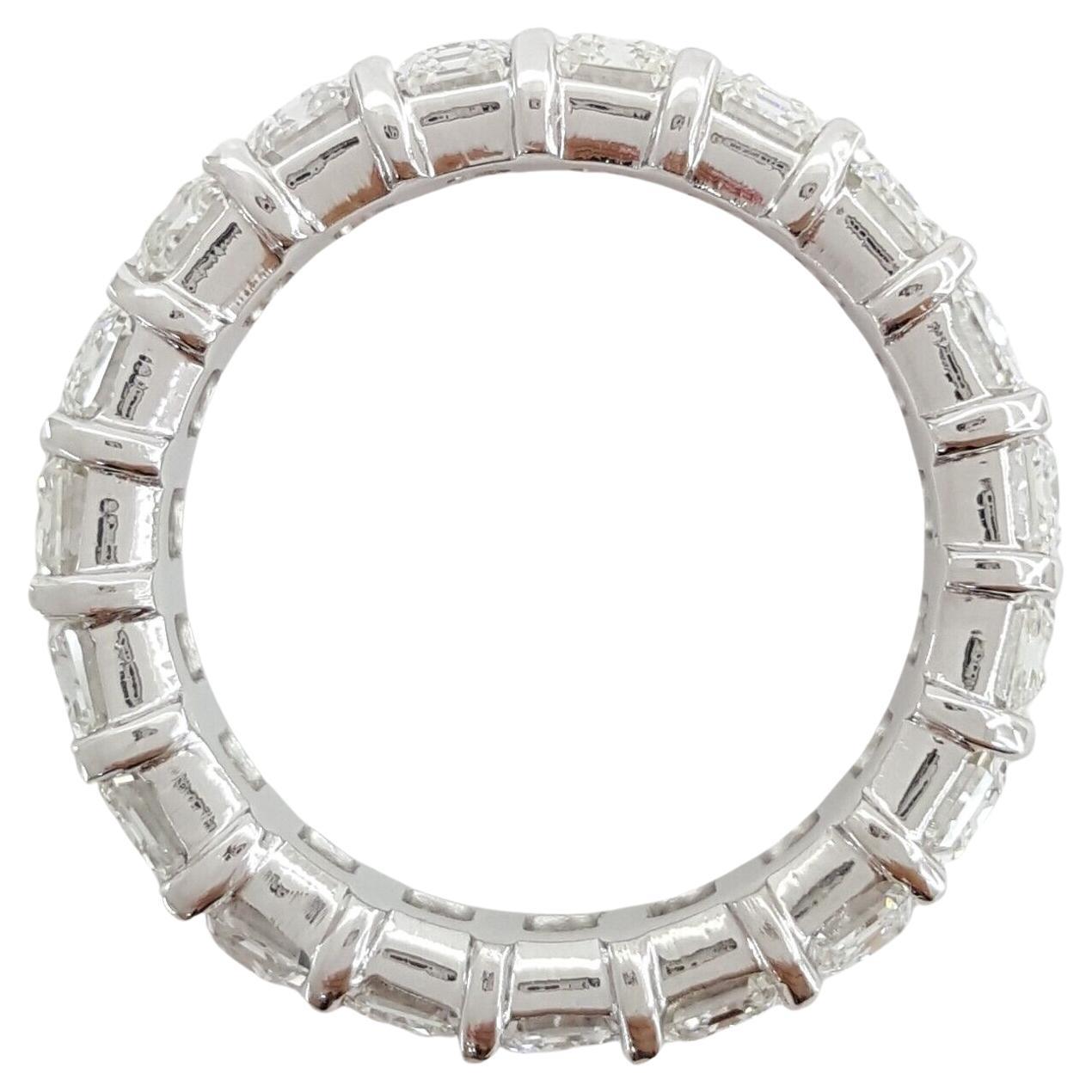 Contemporary 6 Carat Emerald Cut Diamond Eternity Ring For Sale