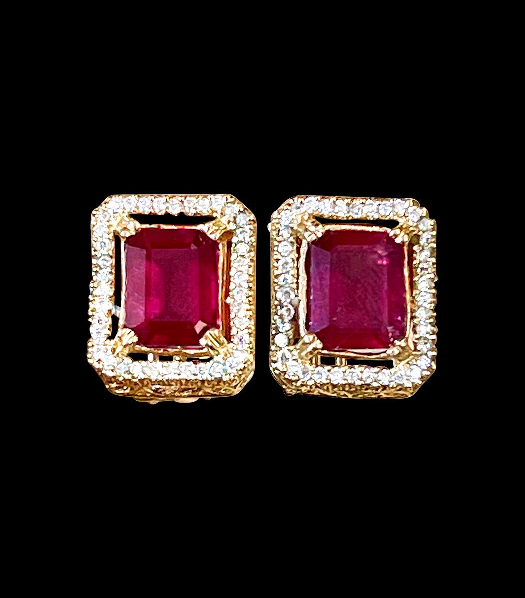6 Carat Emerald Cut Treated Ruby & .7 Ct Diamond Stud Earrings 14 Kt Yellow Gold . Post Back with omega backs to keep in place
This exquisite pair of earrings are beautifully crafted with 14 karat Yellow  gold .
Weight of 14 K gold 7 Grams
Ruby pair