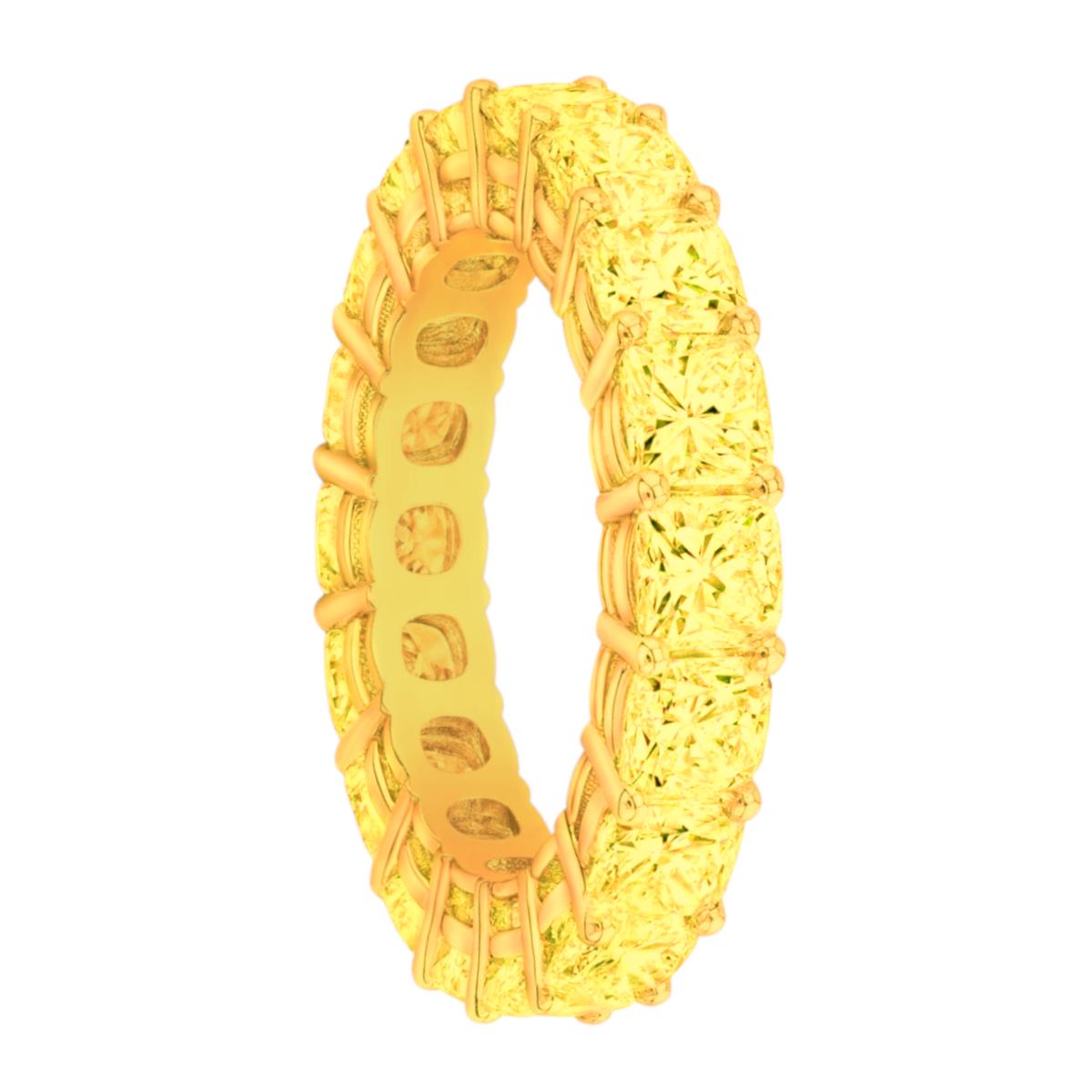 A Fancy Yellow Diamond Eternity Band in 18K Yellow Gold, showcases 18 perfectly matched Cushion shape diamonds. All a natural fancy yellow color, VS clarity and averaging over 35 points each, set in a single row shared prong special design 