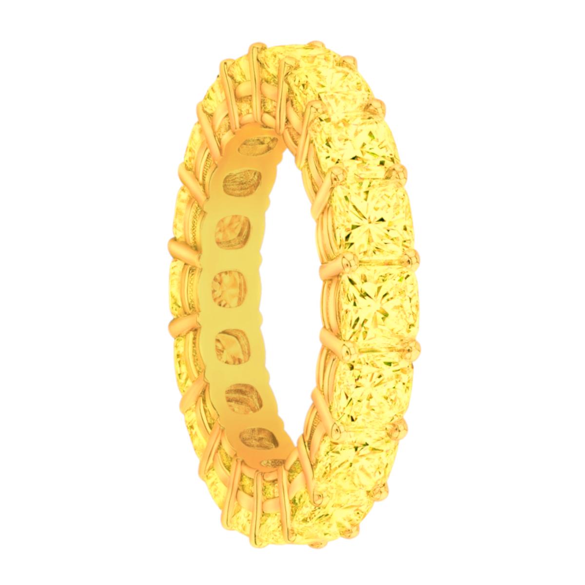 Ce bracelet éternité en or jaune 18 carats est orné de 18 diamants de forme coussin parfaitement assortis. Toutes les pierres sont d'une couleur jaune naturelle, d'une pureté VS et d'une moyenne de plus de 35 points chacune. Elles sont serties dans