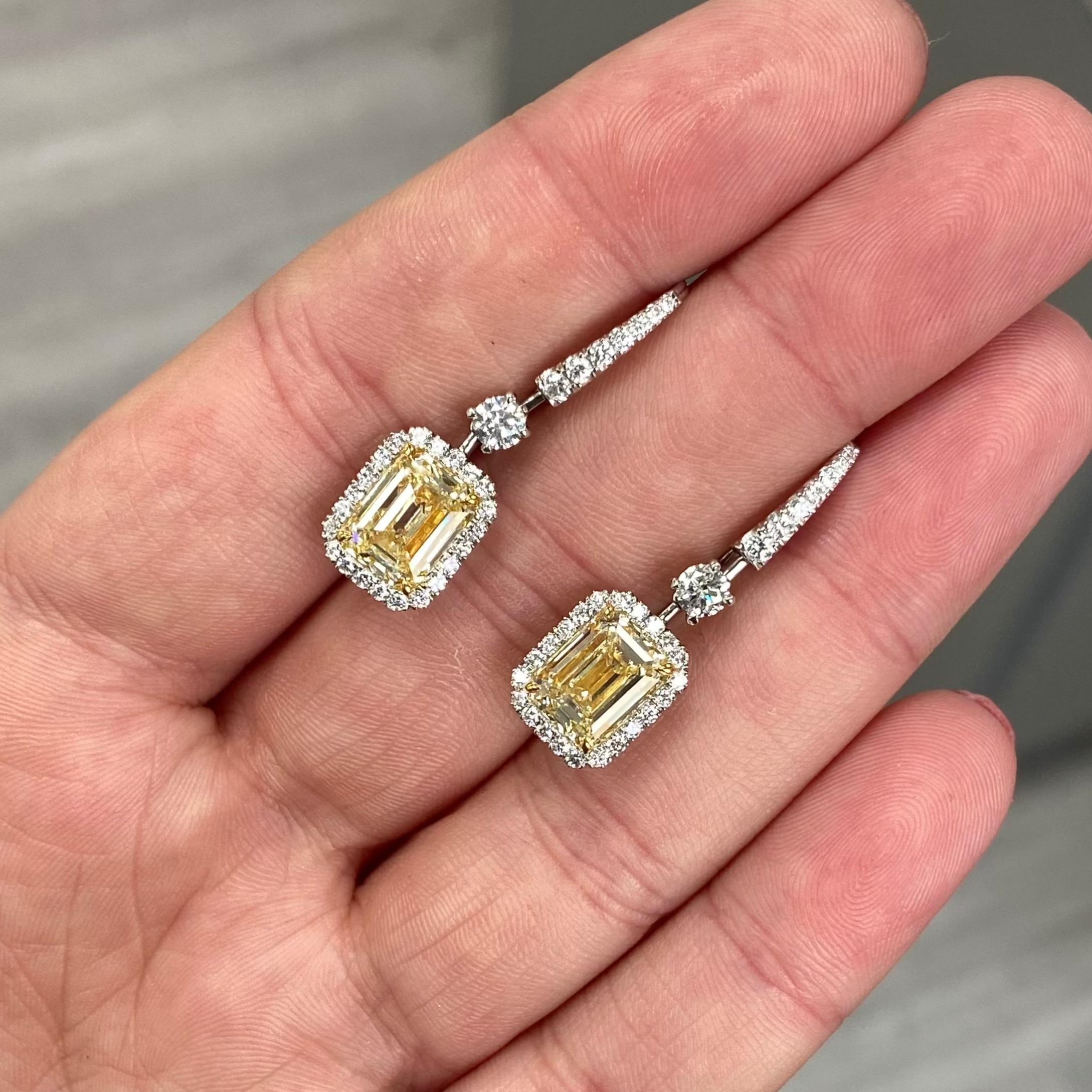 Women's 6 Carat GIA Light Yellow Emerald Cut Diamond Earrings For Sale