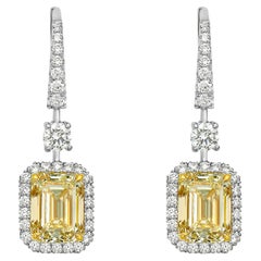 Used 6 Carat GIA Light Yellow Emerald Cut Diamond Earrings