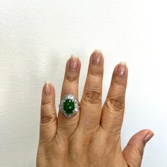 6 Carat Green Jade Oval Cabochon and Baguette Diamond Ring in Platinum