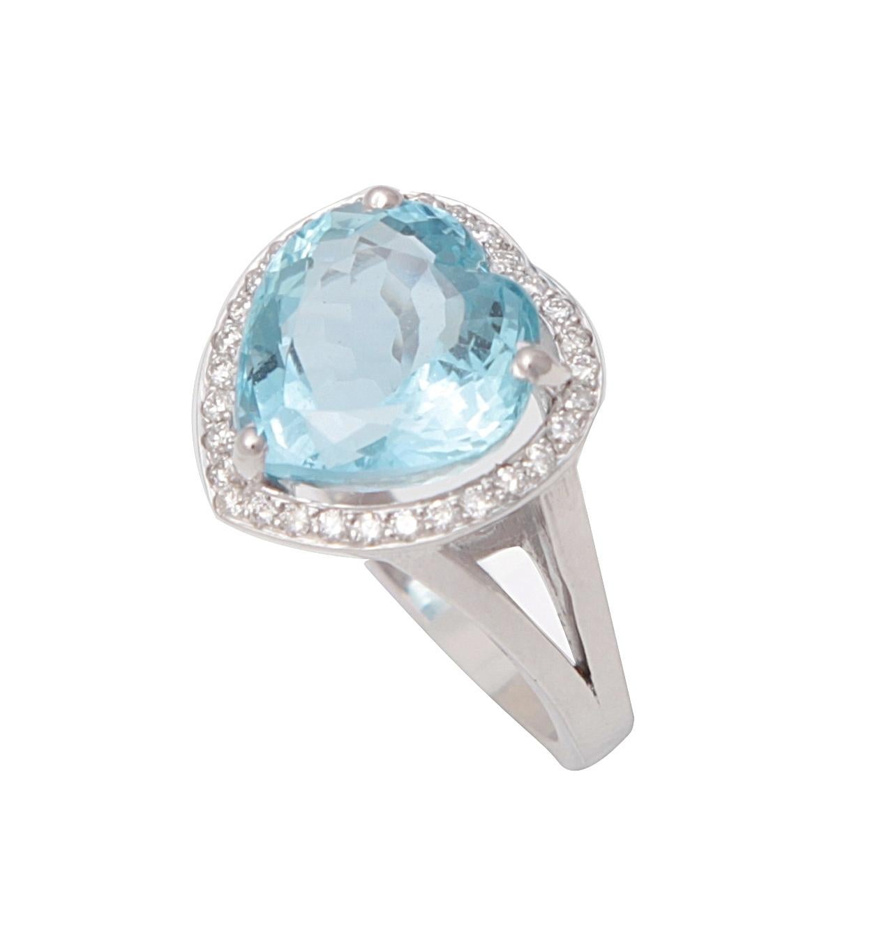 A fine and original ring with a central heart shaped aquamarine surrounded by 35 round cut diamonds.

18K White Gold, 750/1000eme. Eagle's head hallmark

Aquamarine's Weight: 5.95 carats

Diamonds' weight: 0.35 carats

Size FR 52 / US 6