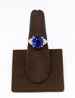 6 Carat Oval Blue Sapphire and Diamond Ring